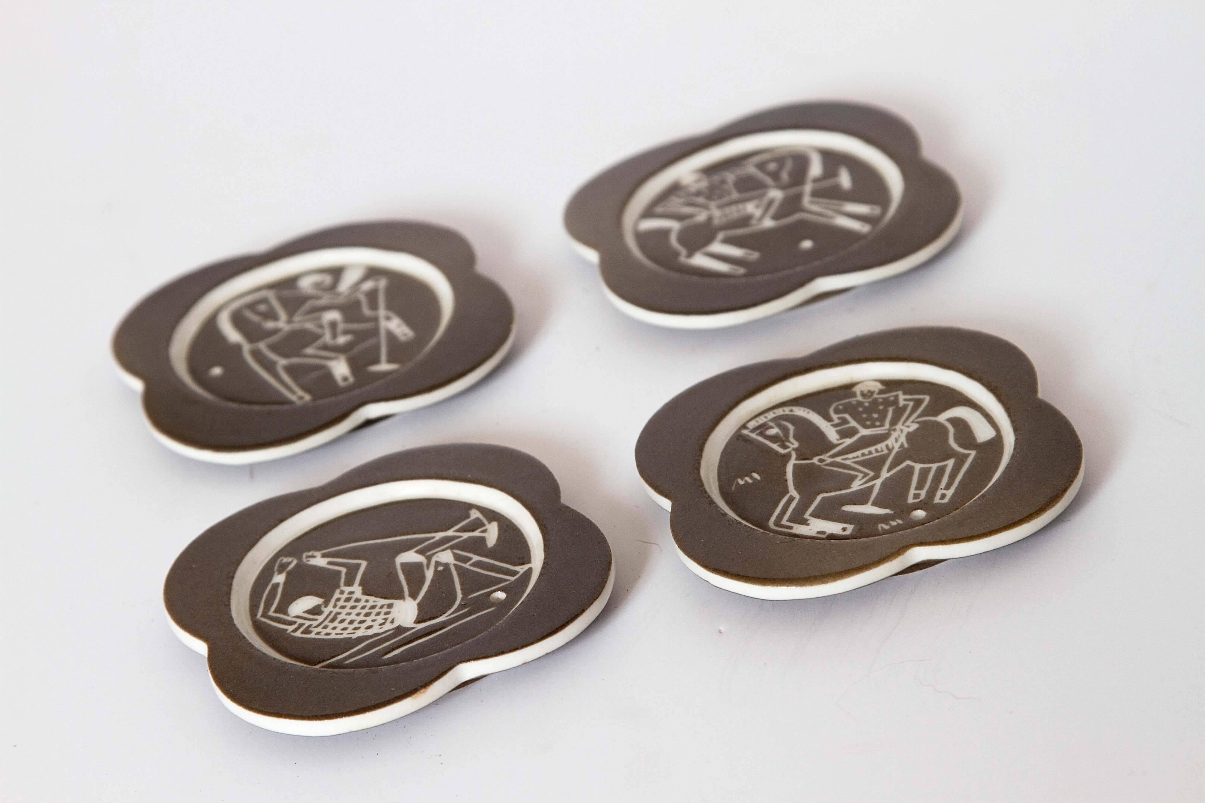 Waylande Gregory Studio Polo Player Art Deco Sgraffito Coasters
Iconic set of four different Polo playing Machine Age images by Gregory.

Likely, circa 1932-1933. One of the Classic early WG Sgraffito designs for his own studio, likely shortly