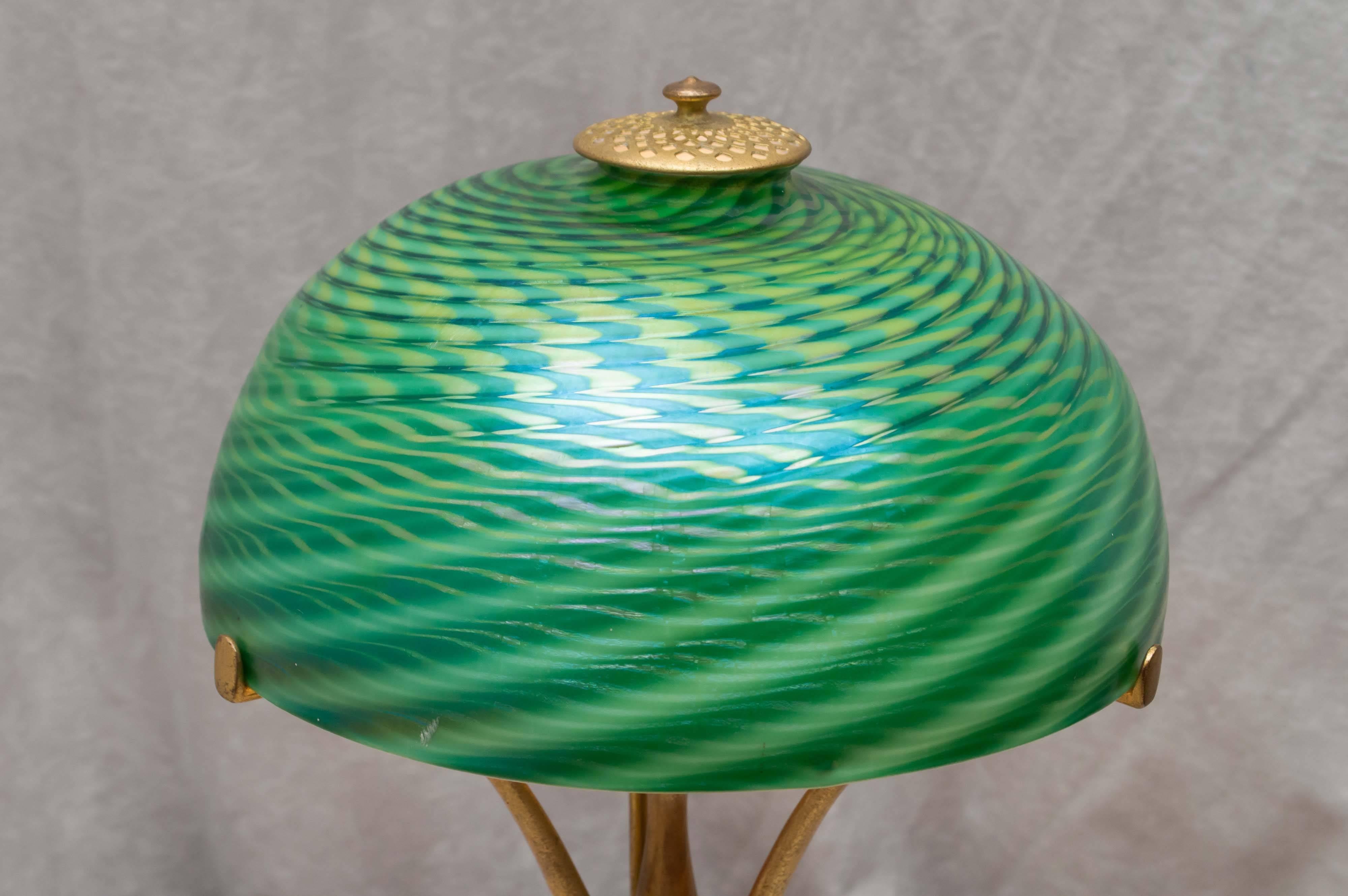 Signed Tiffany Studios Gilt Bronze Base with Damascene Swirl Glass Shade In Excellent Condition In Petaluma, CA