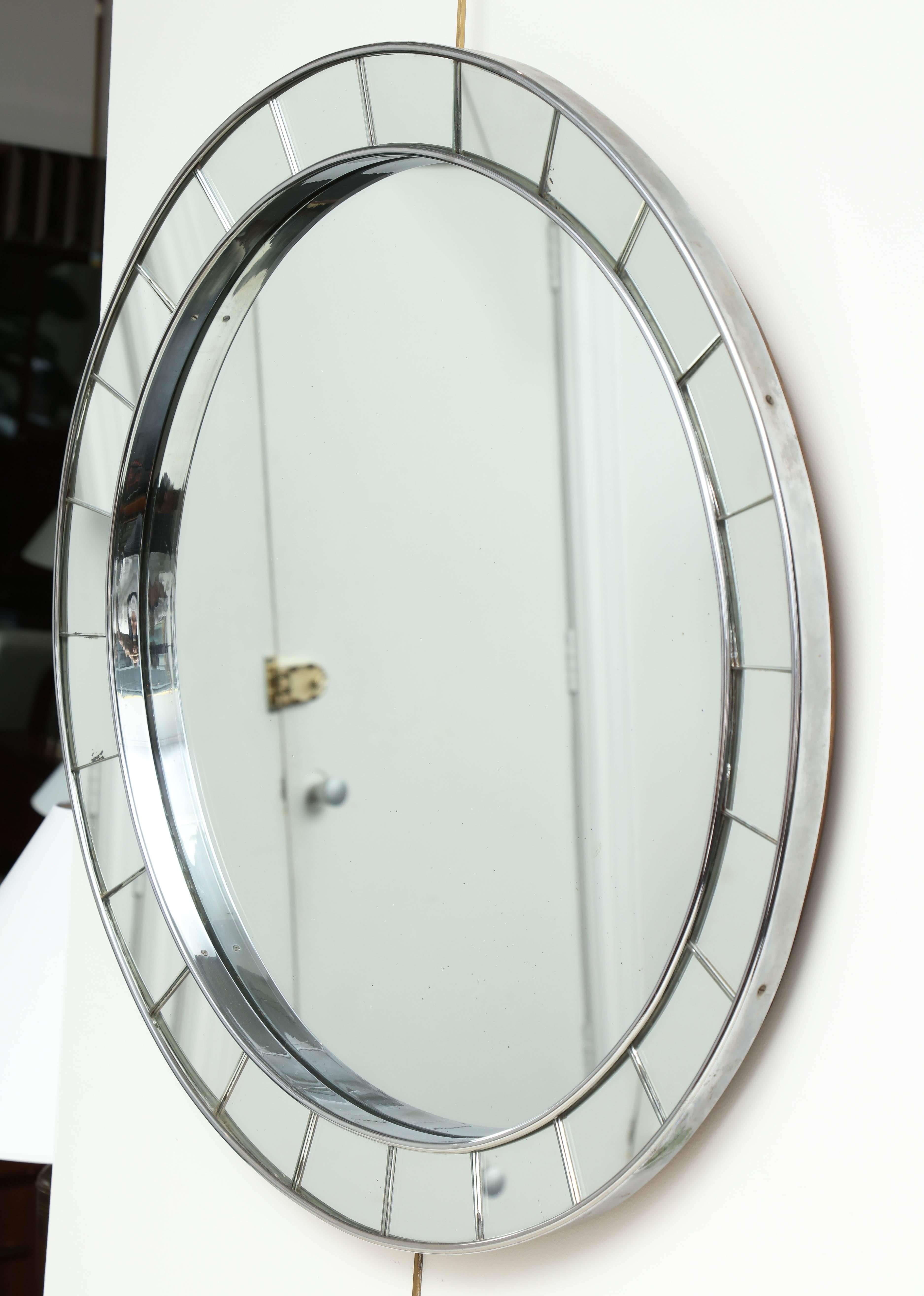 Mid-20th century round mirror, baguette borders
