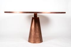 Round table at cost price.