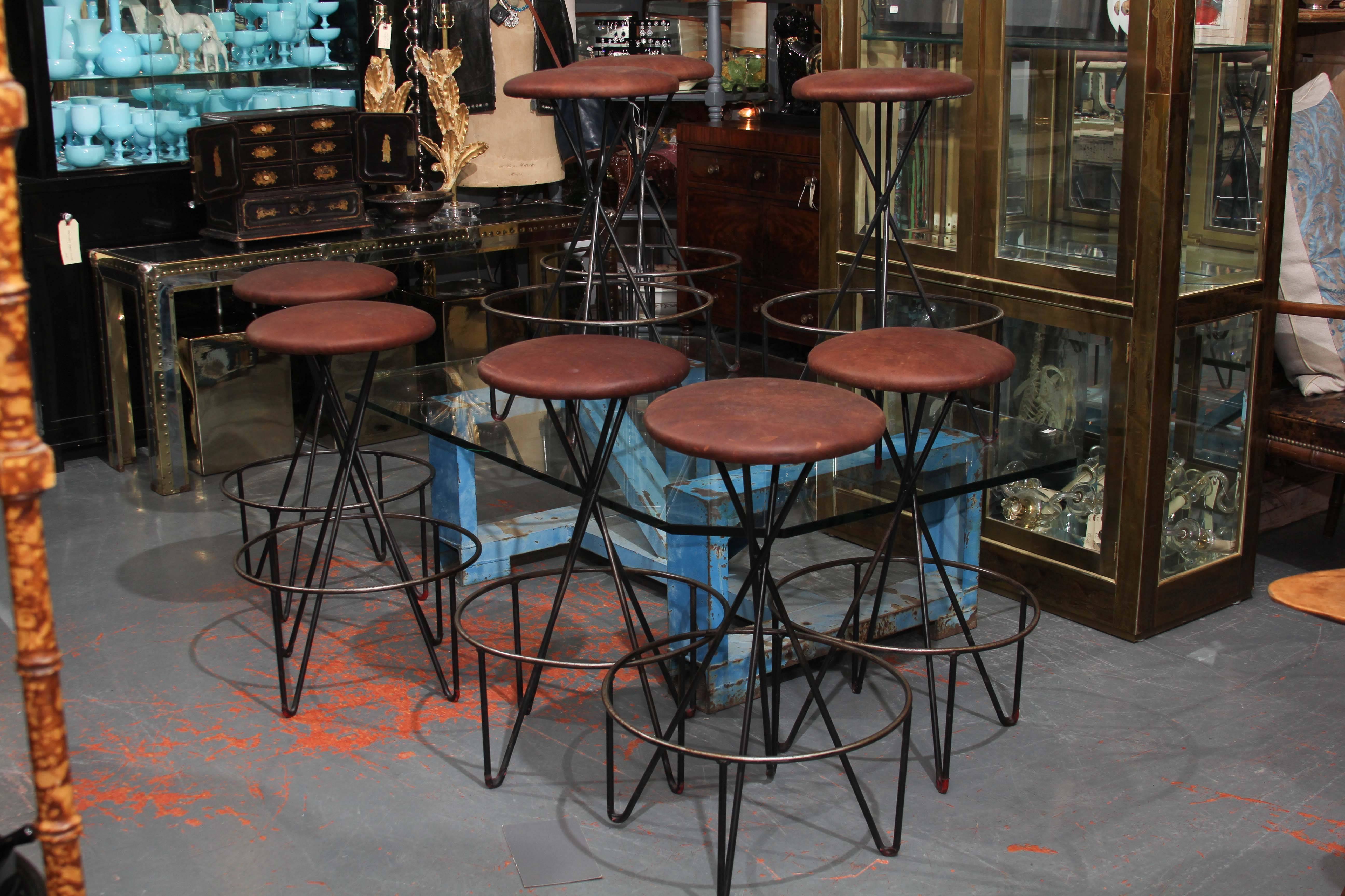 Set of eight vintage barstools with new leather seats. Very sturdy, very comfy and stabile. Very likely Paul Tuttle.
