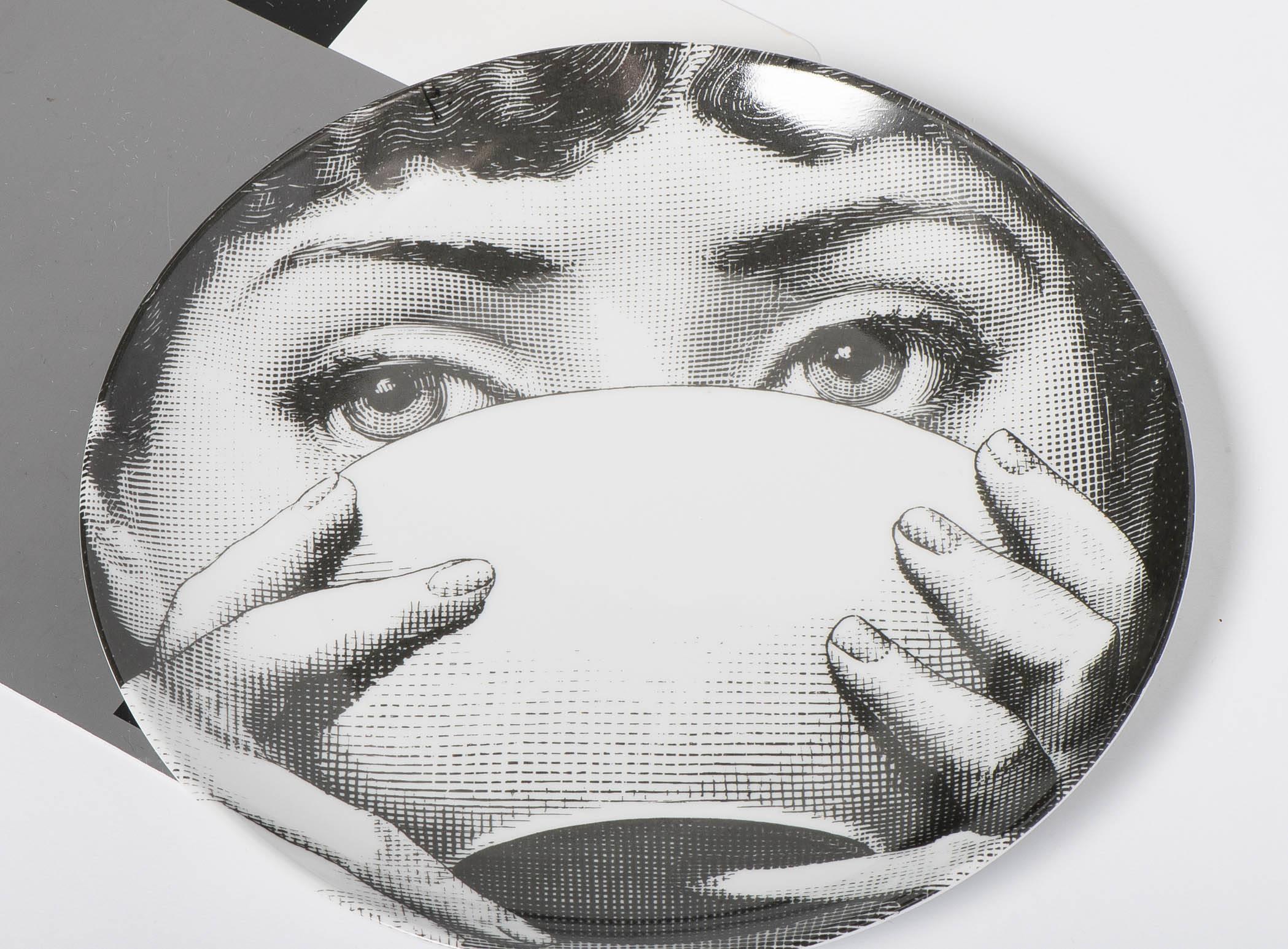 A porcelain plate by Atelier Fornasetti.
“Themes and Variations”
Lithographically printed.
Marks to back.
Italy, circa 1990.
Measures: 26 cm diameter.