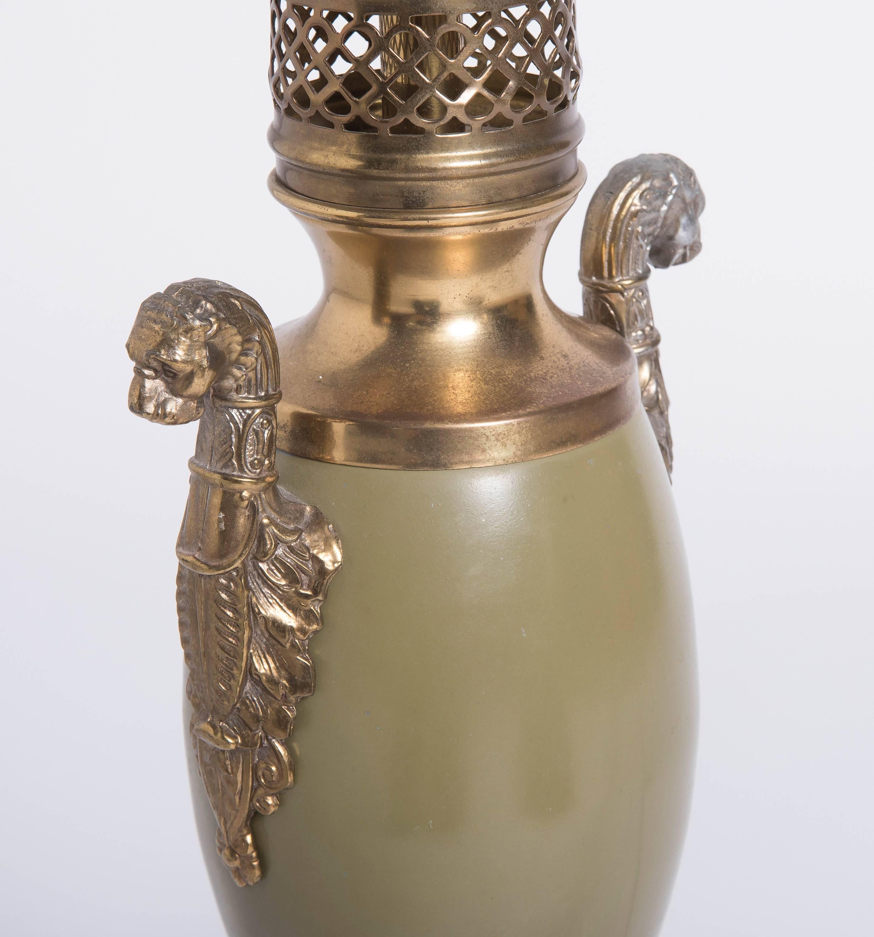 Mid-20th Century Metal lamp of Amphora shape with lion head handles, USA circa 1950 For Sale