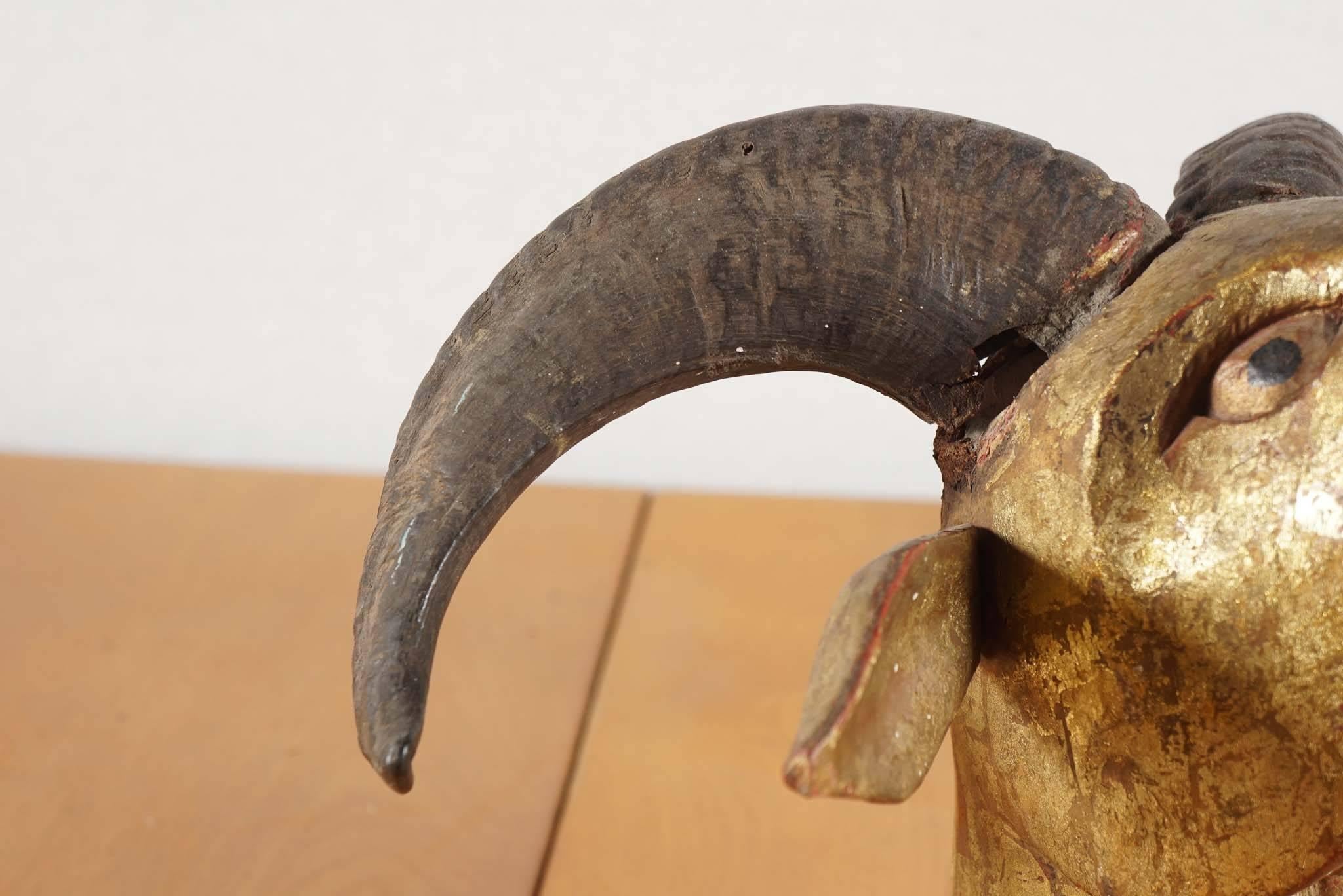 Indonesian Carved Wood and Gold Washed Ram's Head, circa 1920 In Good Condition In Hudson, NY