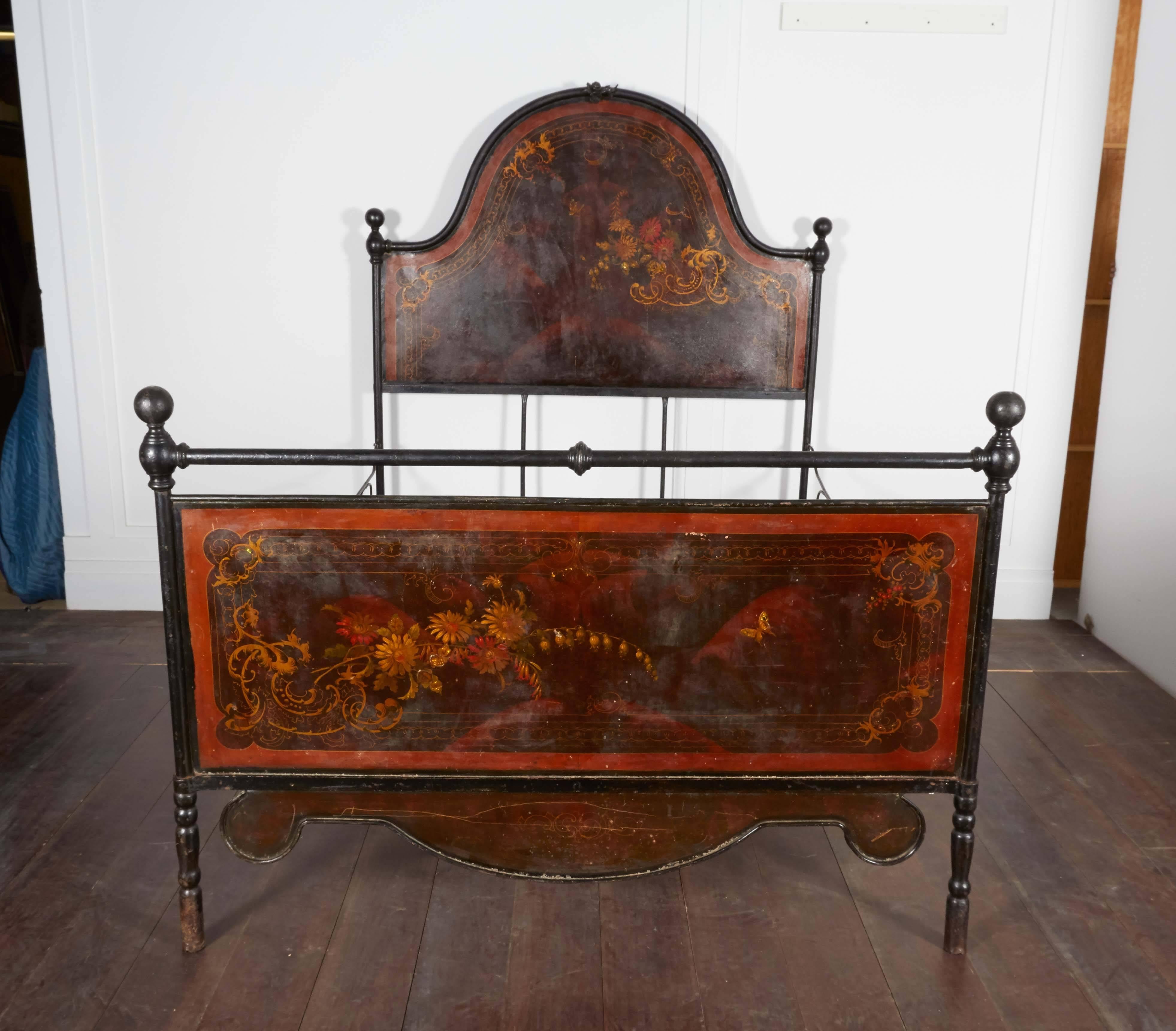 Queen-size Campaign iron bed with hand-painted headboard and foot board.

Not available for sale or to ship in the state of California.