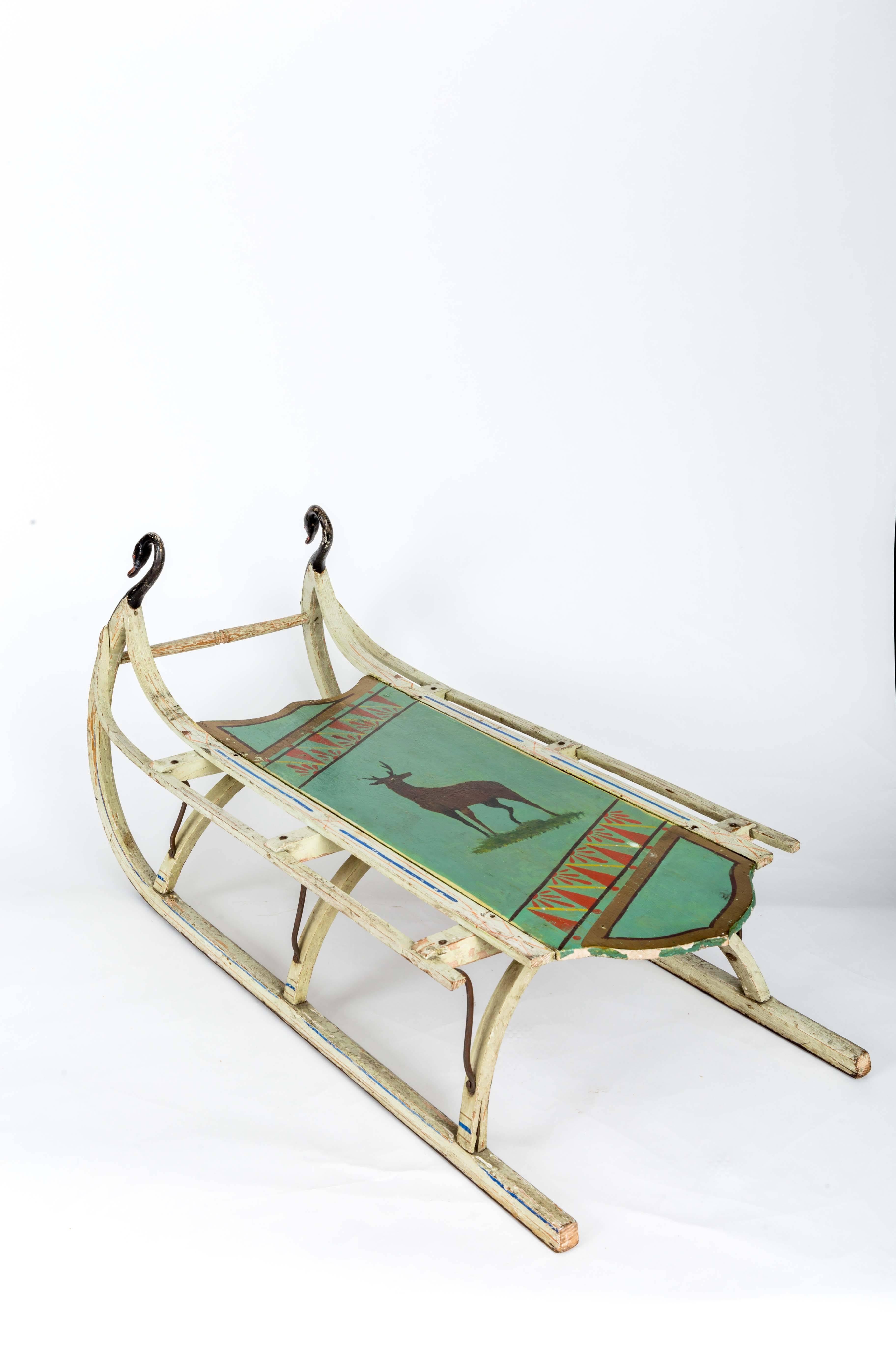 19th-century wooden sled with original paint 