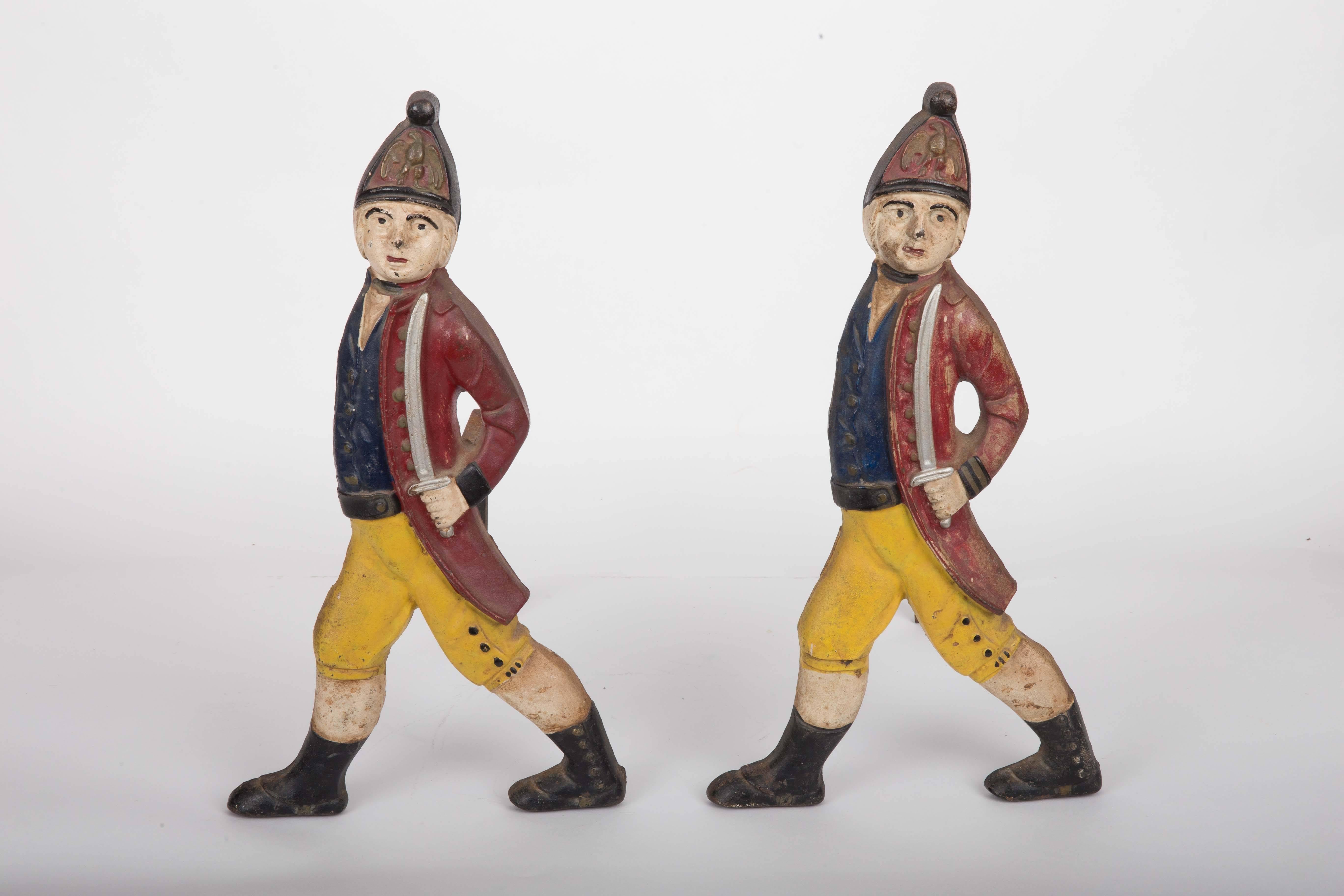 Set of polychrome Hessian soldier andirons with two matching fire tools and stand.
Measures: 
Figure set: 15 D x 10 W x 20 H.
Tools: 10 D x 6 W x 31 H.