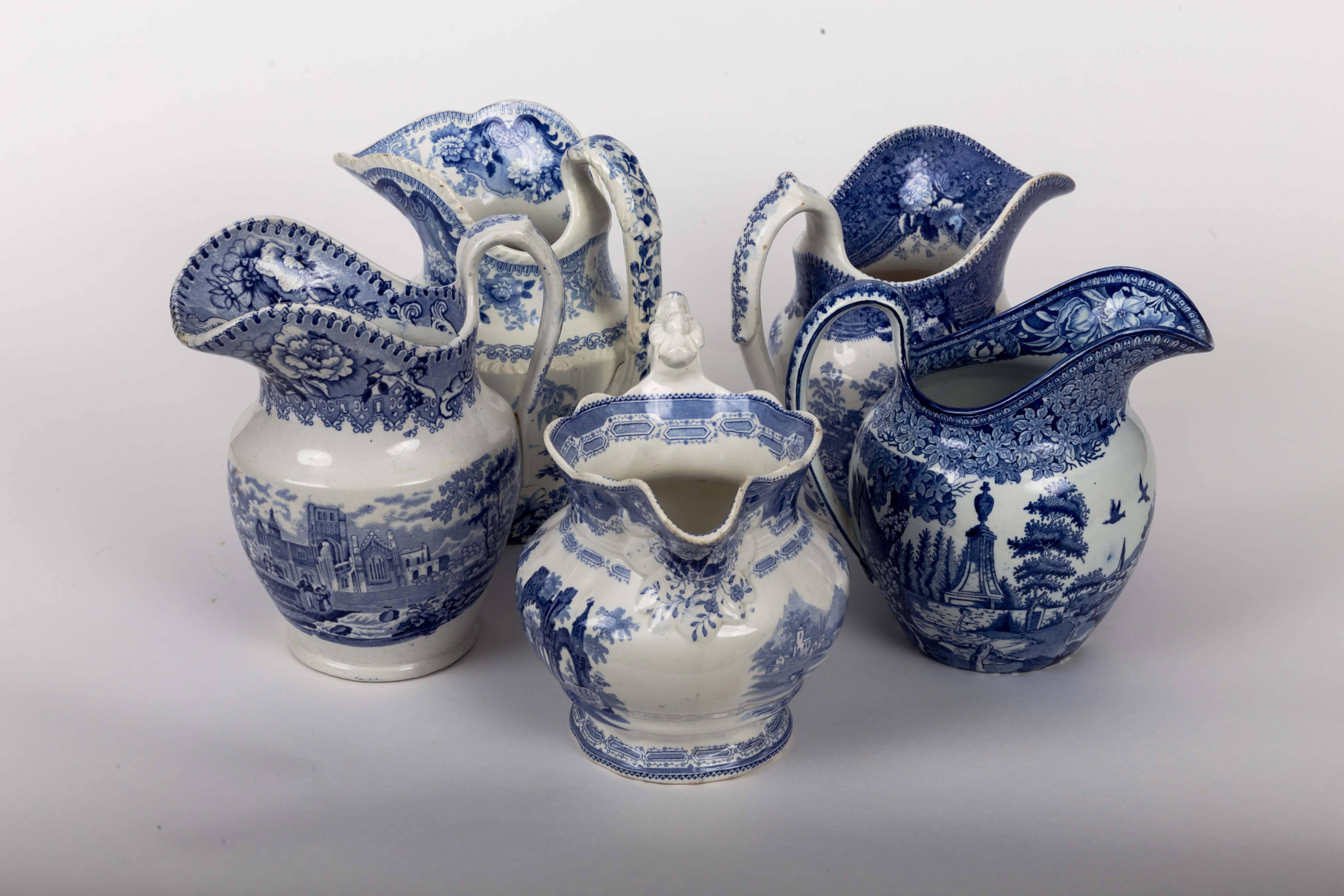 Various dimensions.
Blue and white Staffordshire jugs.