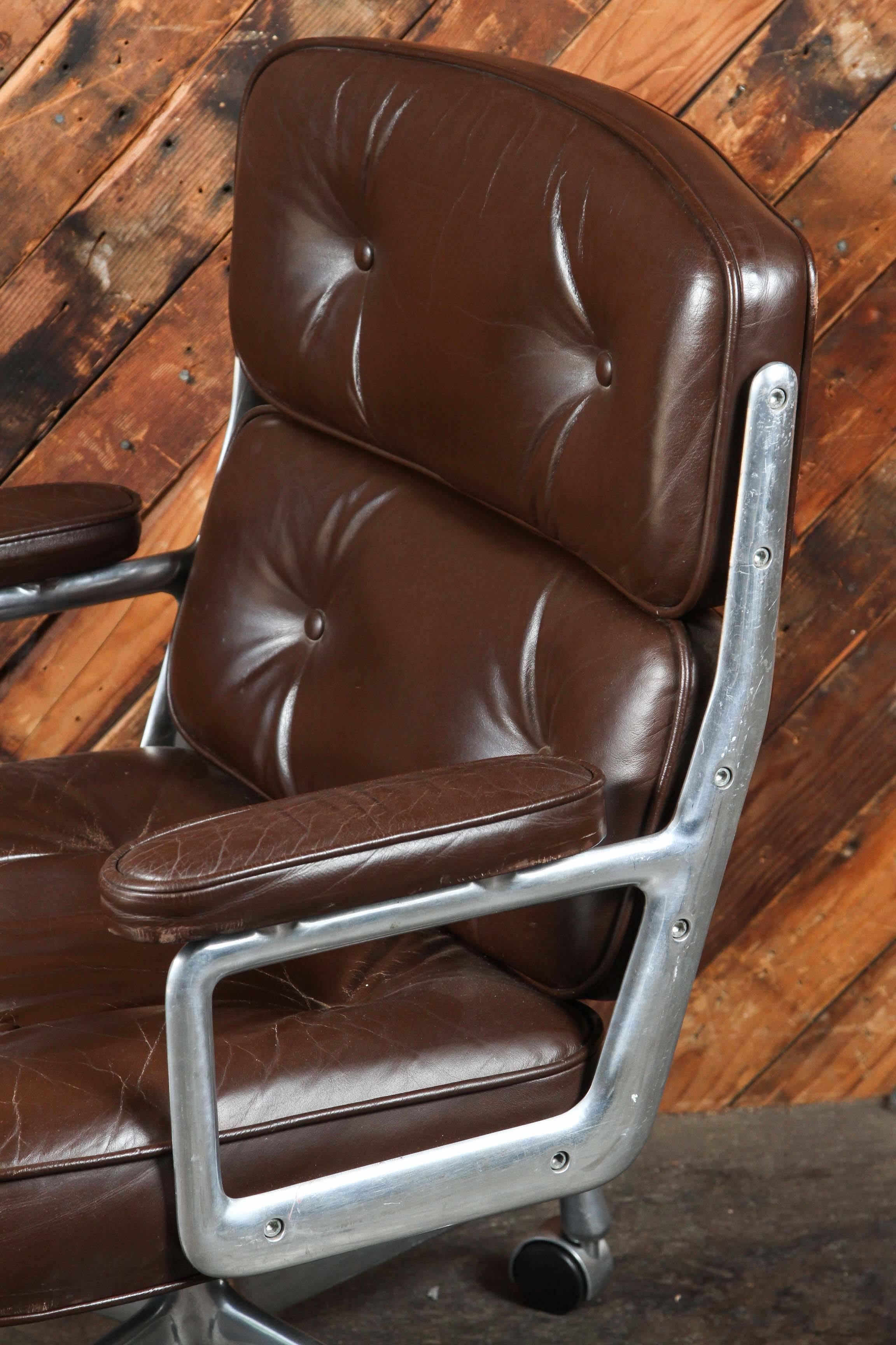 Aluminum  Time Life Chair by Charles and Ray Eames in Rich Brown Leather