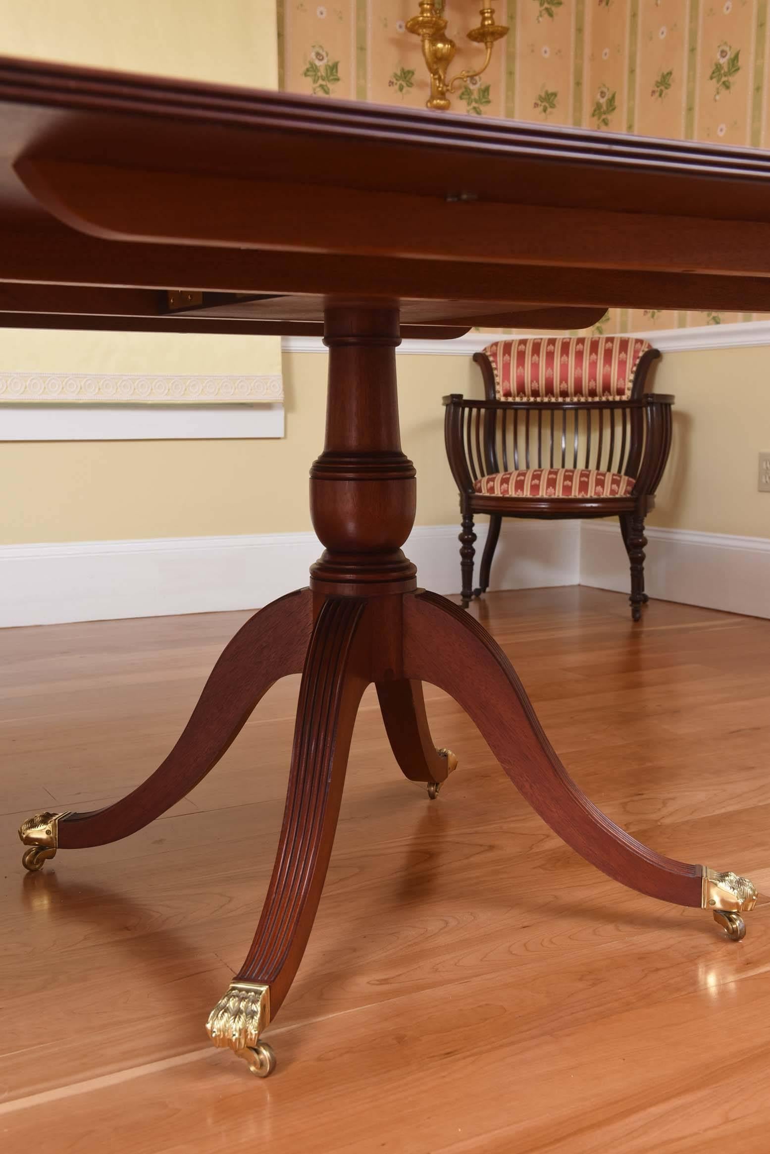 Impressive Long Solid Mahogany Dining Room Table, Triple Pedestal, Inlaid Band In Good Condition In West Palm Beach, FL