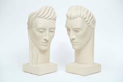 Deco Head Sculptures of Woman and Man with Minimalist Expression