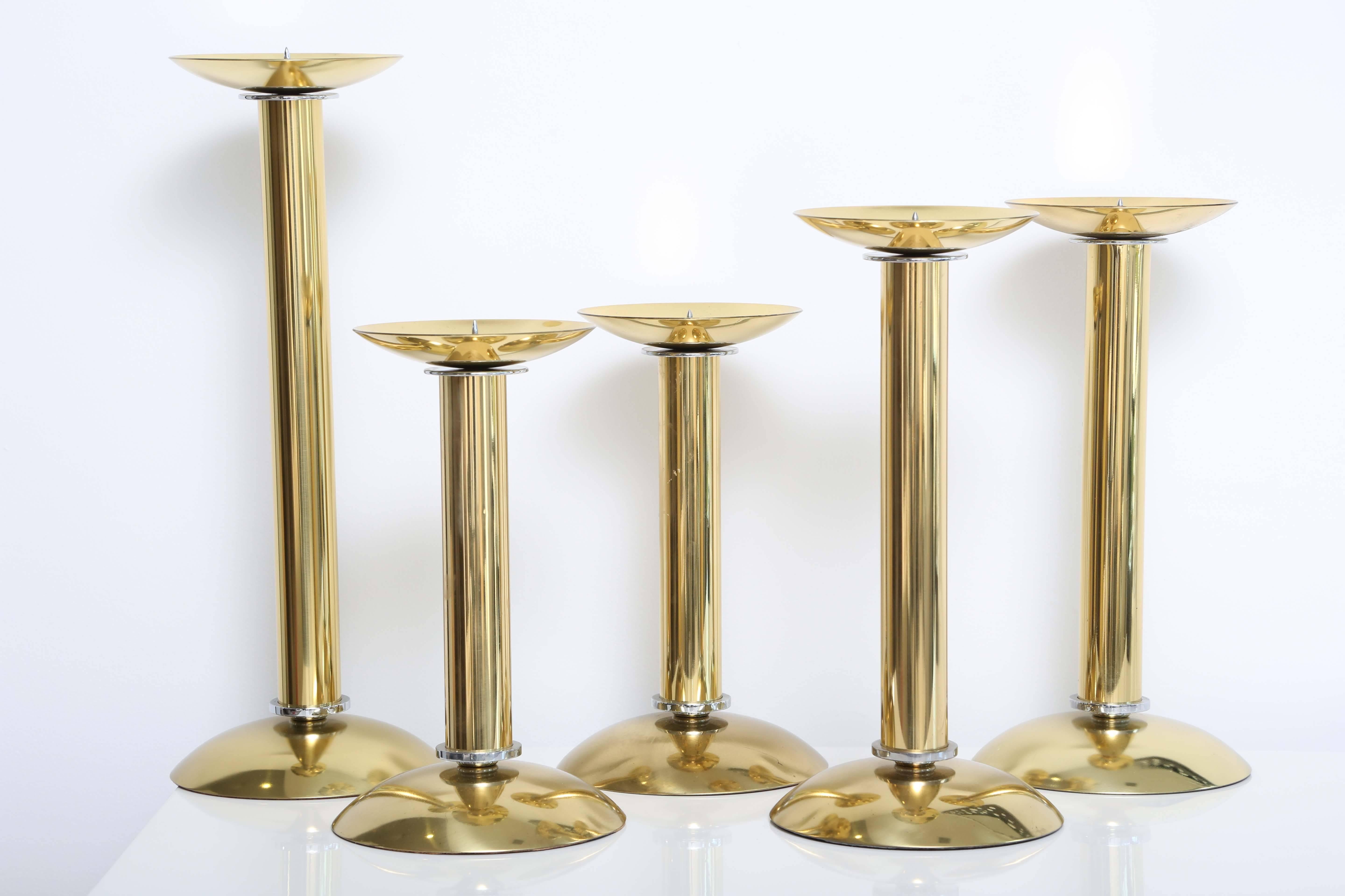 Group of five Karl Springer two-tone brass and steel candlesticks of various heights.
Various heights:
tallest 19.75 x 6.25
2- 15.75 x 6.5
2- 13 x 6.25.