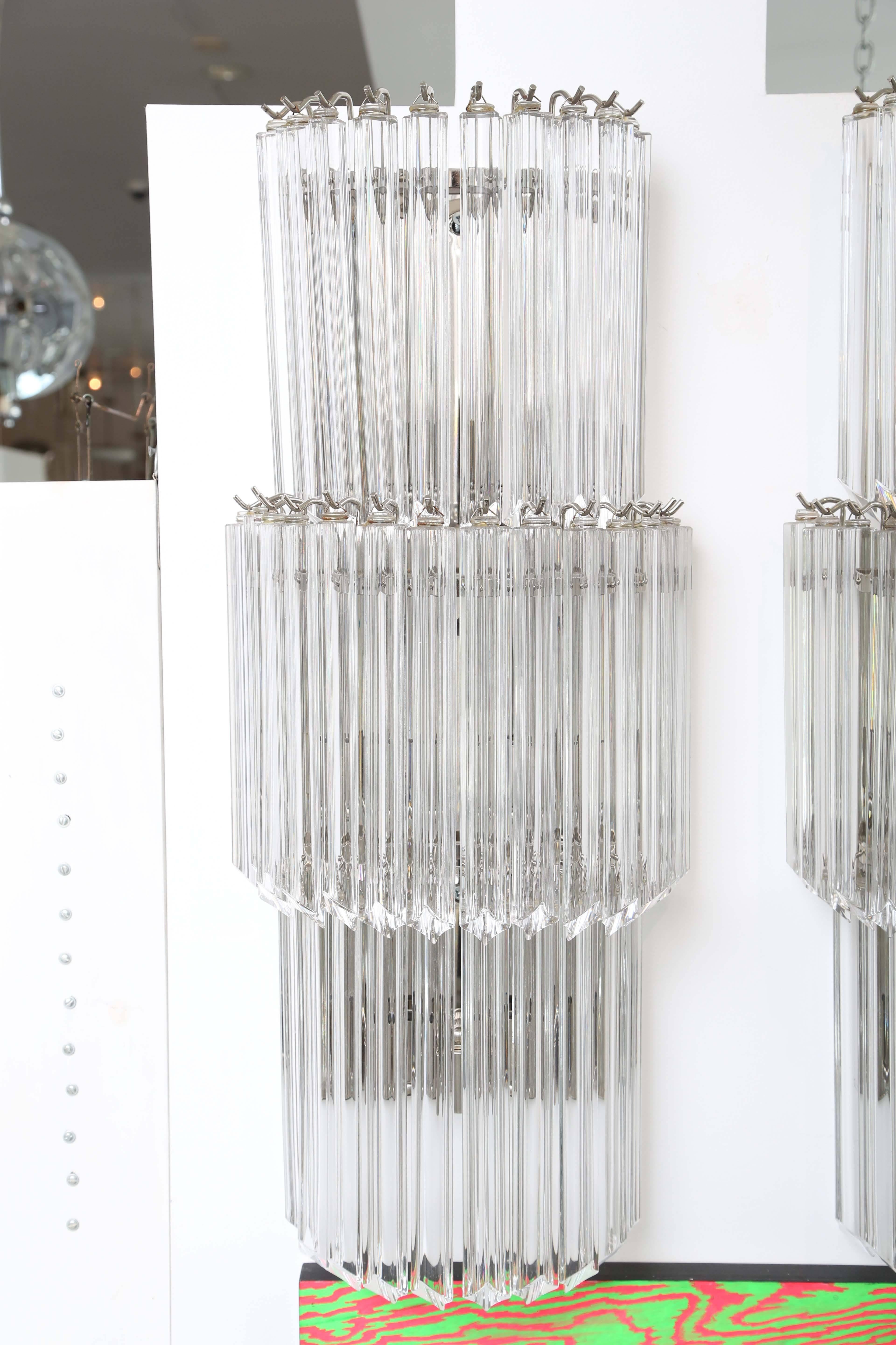 Pair of newly nickel-plated crystal glass sconces by Camer.