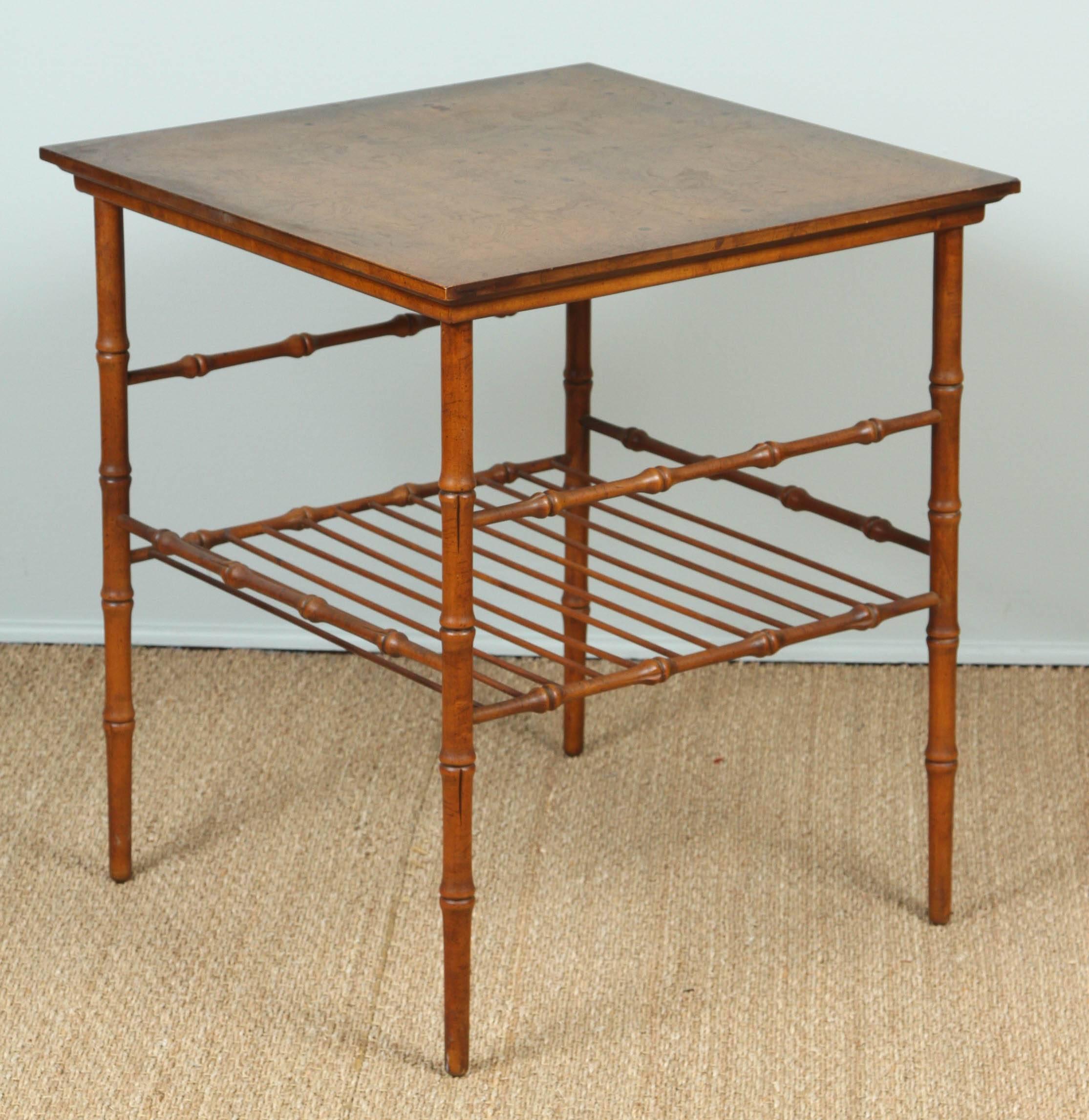 Faux bamboo side table with magazine rack. Out of production design from American company still in business. Maker's mark visible on underside of top.