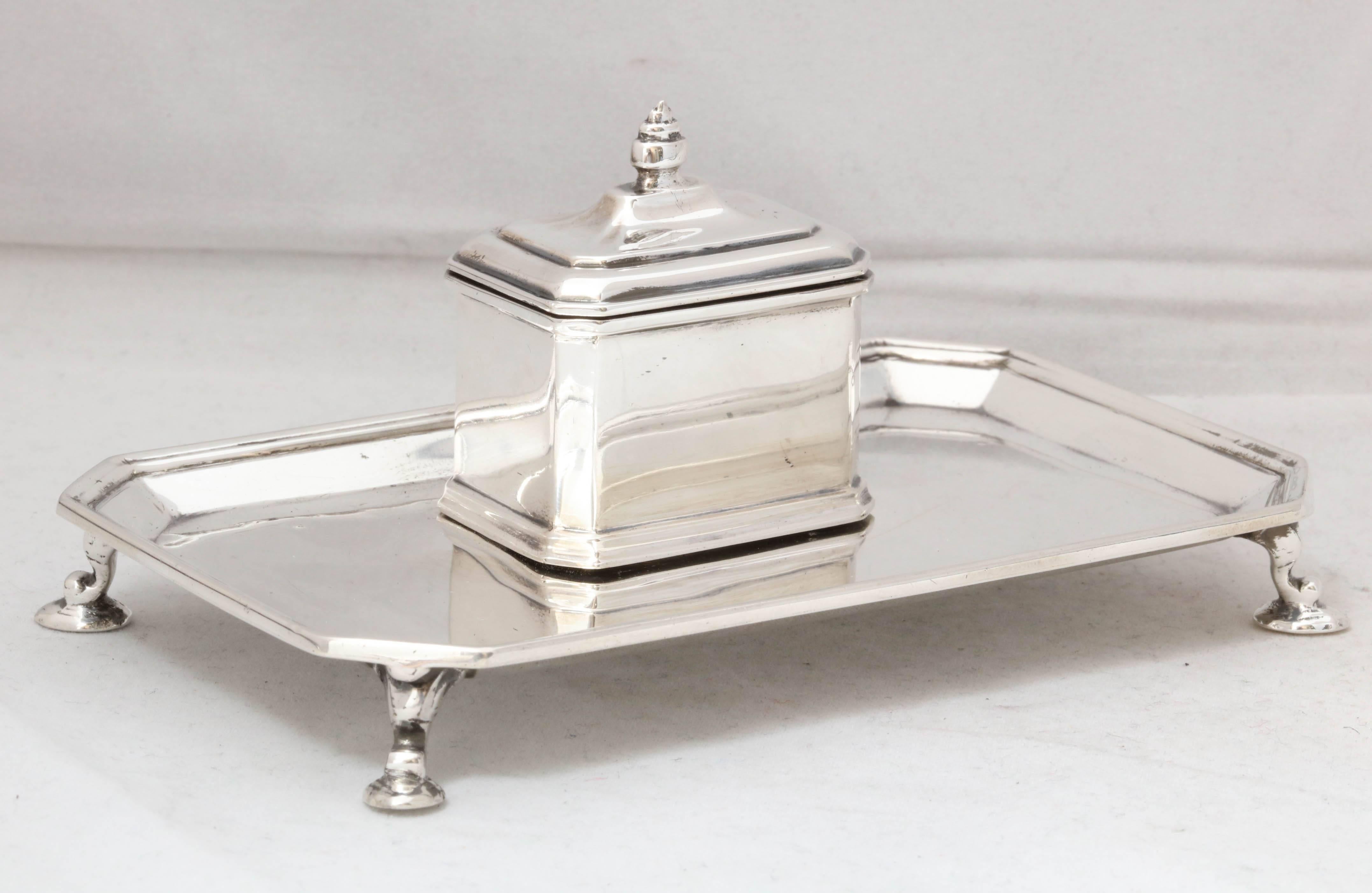 Art Deco, sterling silver inkwell on sterling silver footed inkstand,  Birmingham, England, year-hallmarked for 1927,  Mappin & Webb - makers. Has glass liner. Measures: 3 1/8 inches high x 5 1/4