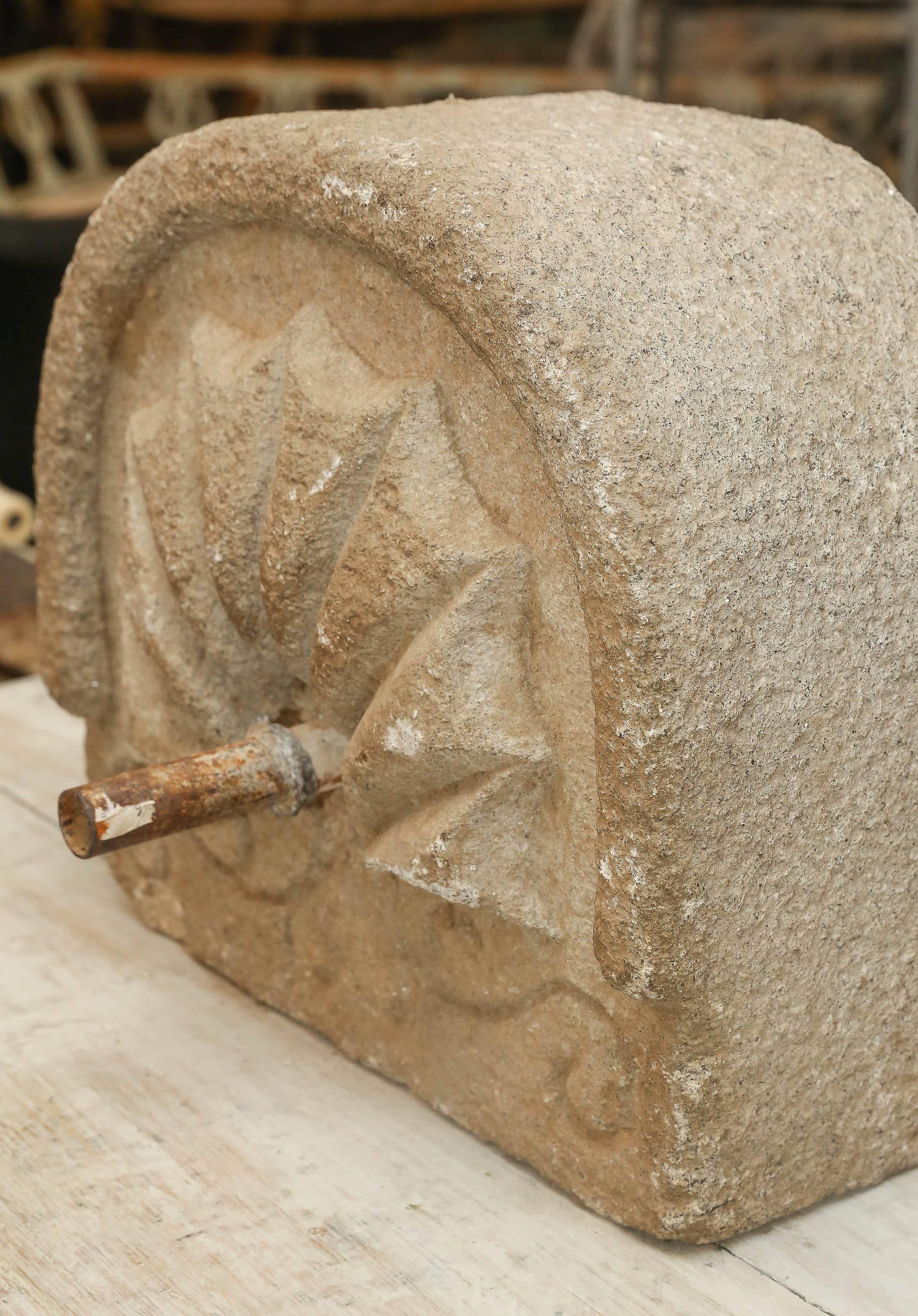 Stone fountain from Portugal with iron spout from 1800s or before. It is great for an outdoor fountain or back mount for a sink.

The dimensions of the depth with the spout is 11".