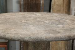 Ancienne table de jardin italienne de forme ovale en pierre avec base en pierre d'origine