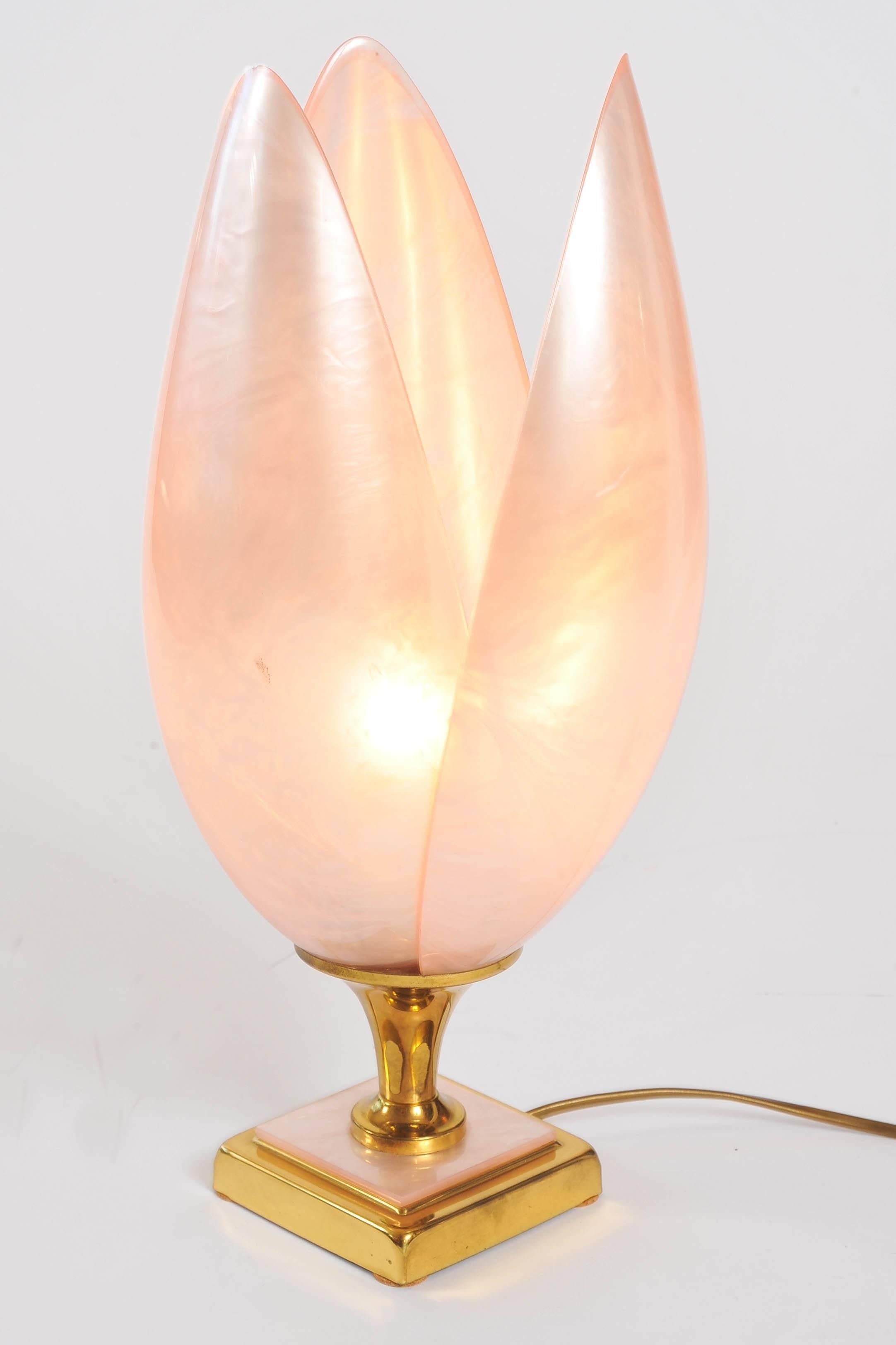 Unusual, Italian lamp in the form of a lotus flower with pink 'marbling' emanating from a 'bronze' stepped base, all cast in acrylic.