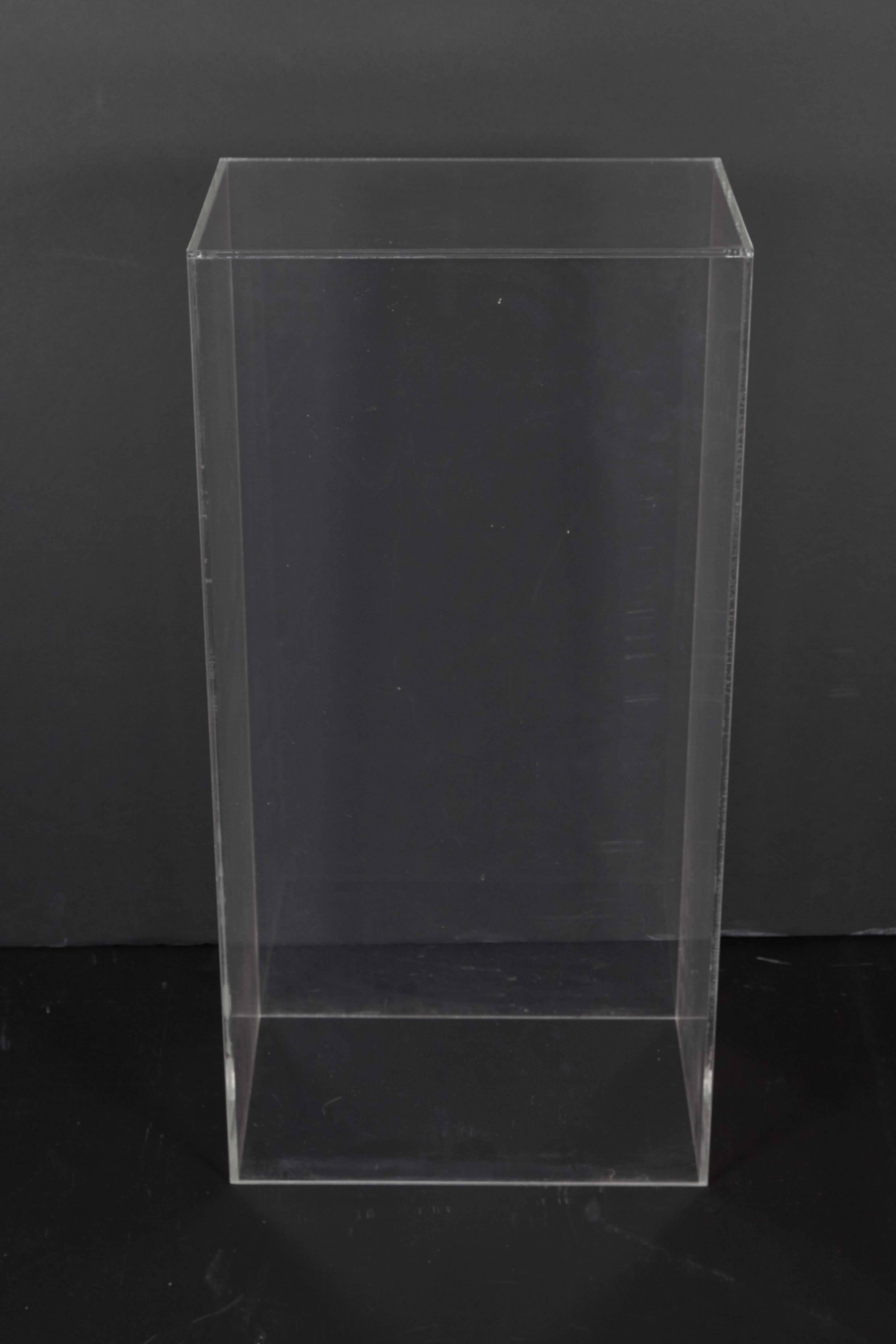 A clear acrylic pedestal, ideal for purposes of display. Very good condition, wear consistent with age and use.