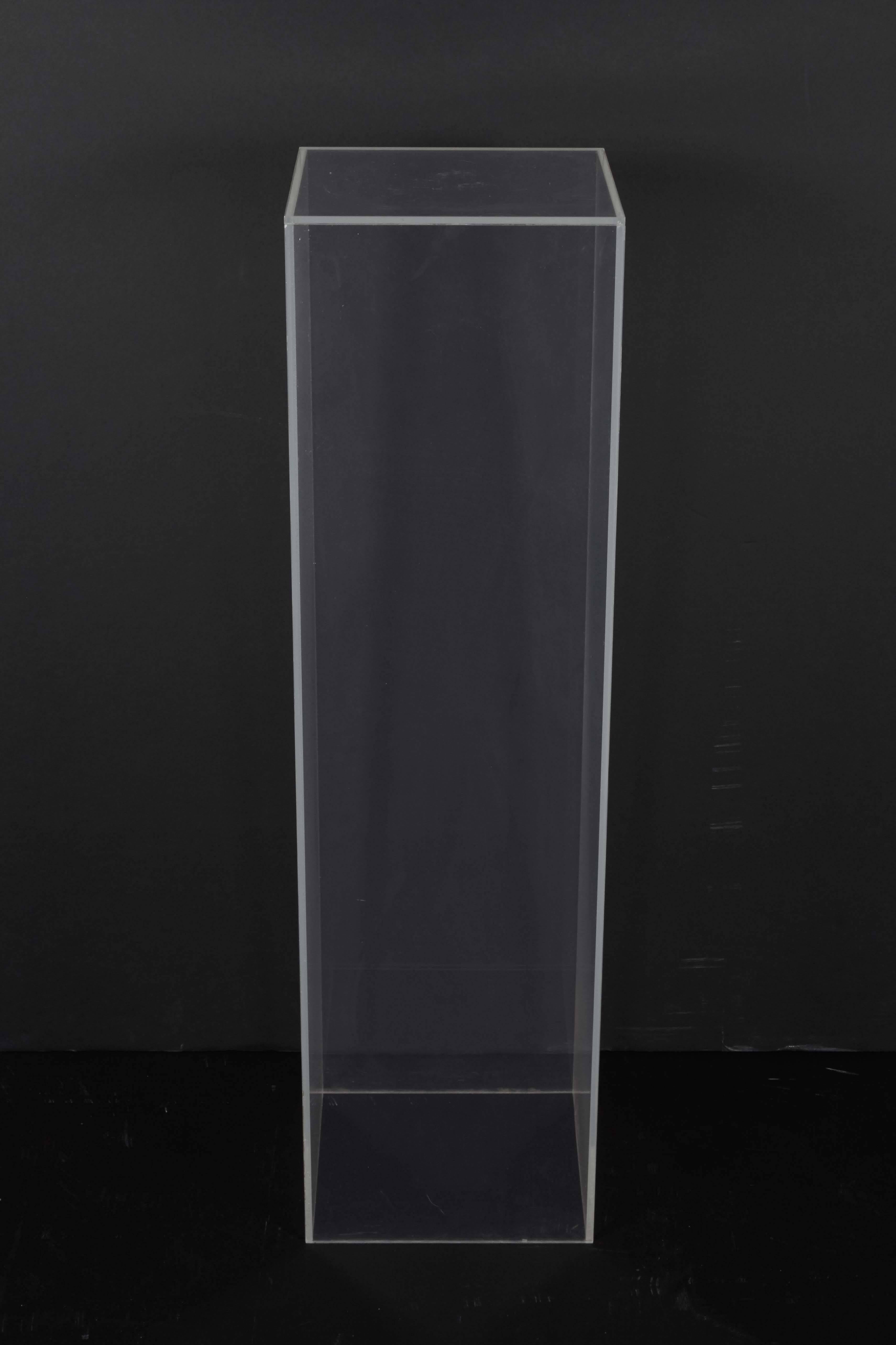 A pedestal and stand, comprised of sheets of clear plexiglass. Very good condition, wear consistent with age and use.

10360