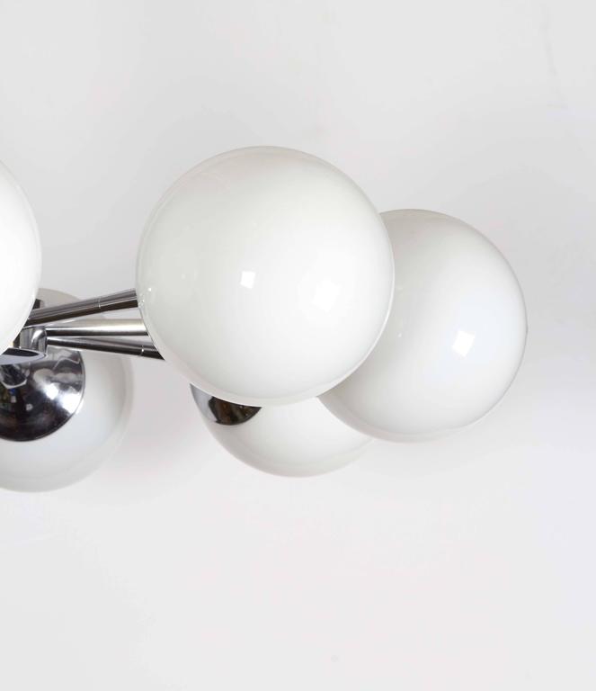 Pair of Lightolier Glass Globe Chandeliers in Chrome In Good Condition For Sale In New York, NY