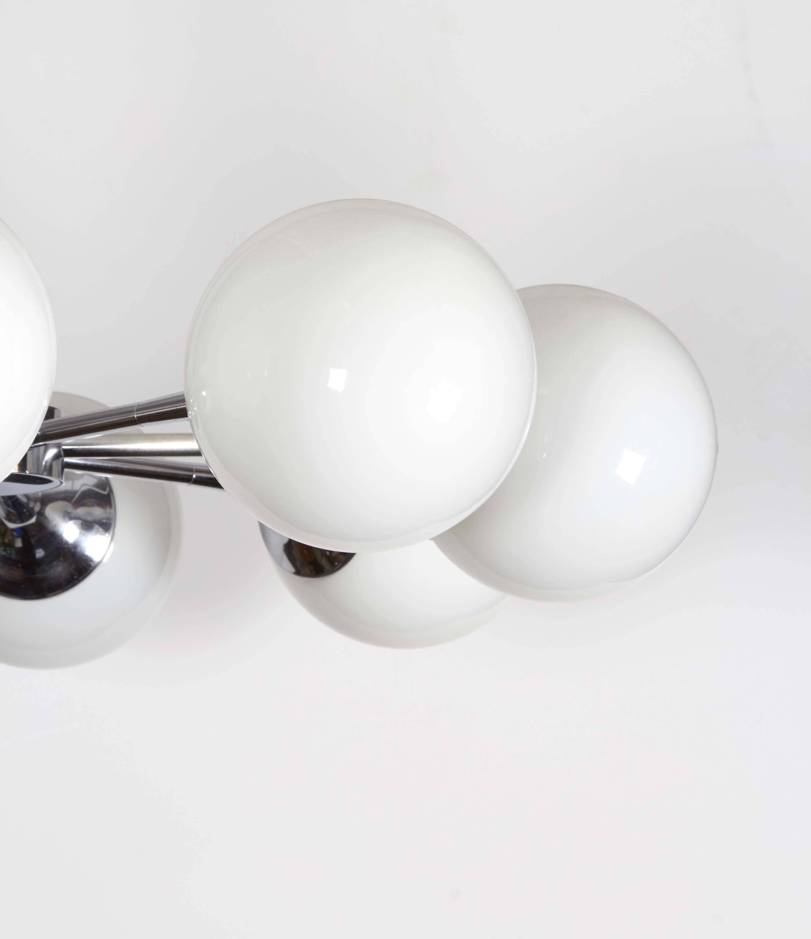 Pair of Lightolier Glass Globe Chandeliers in Chrome In Good Condition In New York, NY