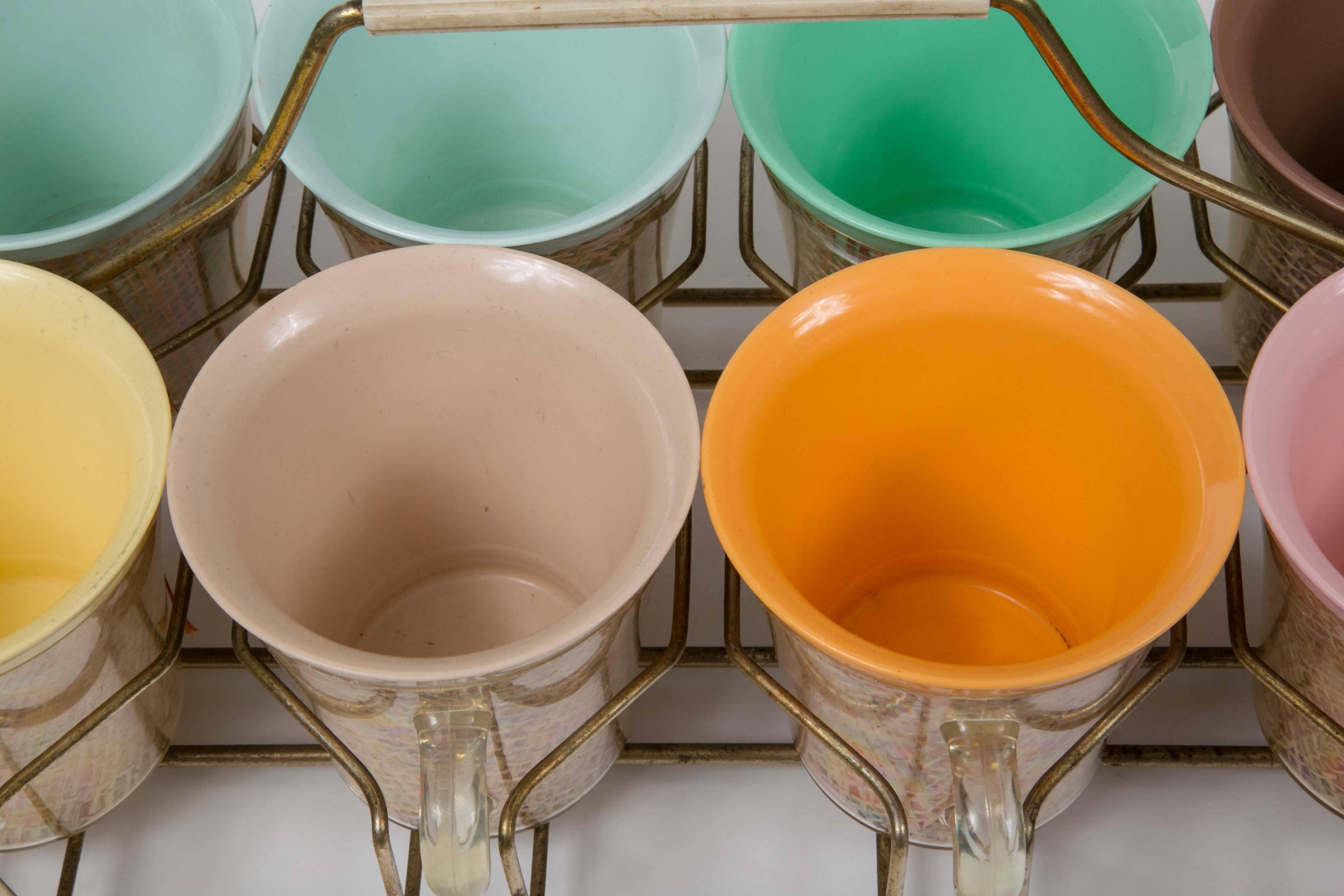 1950s Joan Cleaver style tea, coffee or sherbet cups and caddy - pastel colors. A fun set of eight, great color with basket weave cup clear handles and great pastel colors. Summer fun - anytime spunk....be unique.