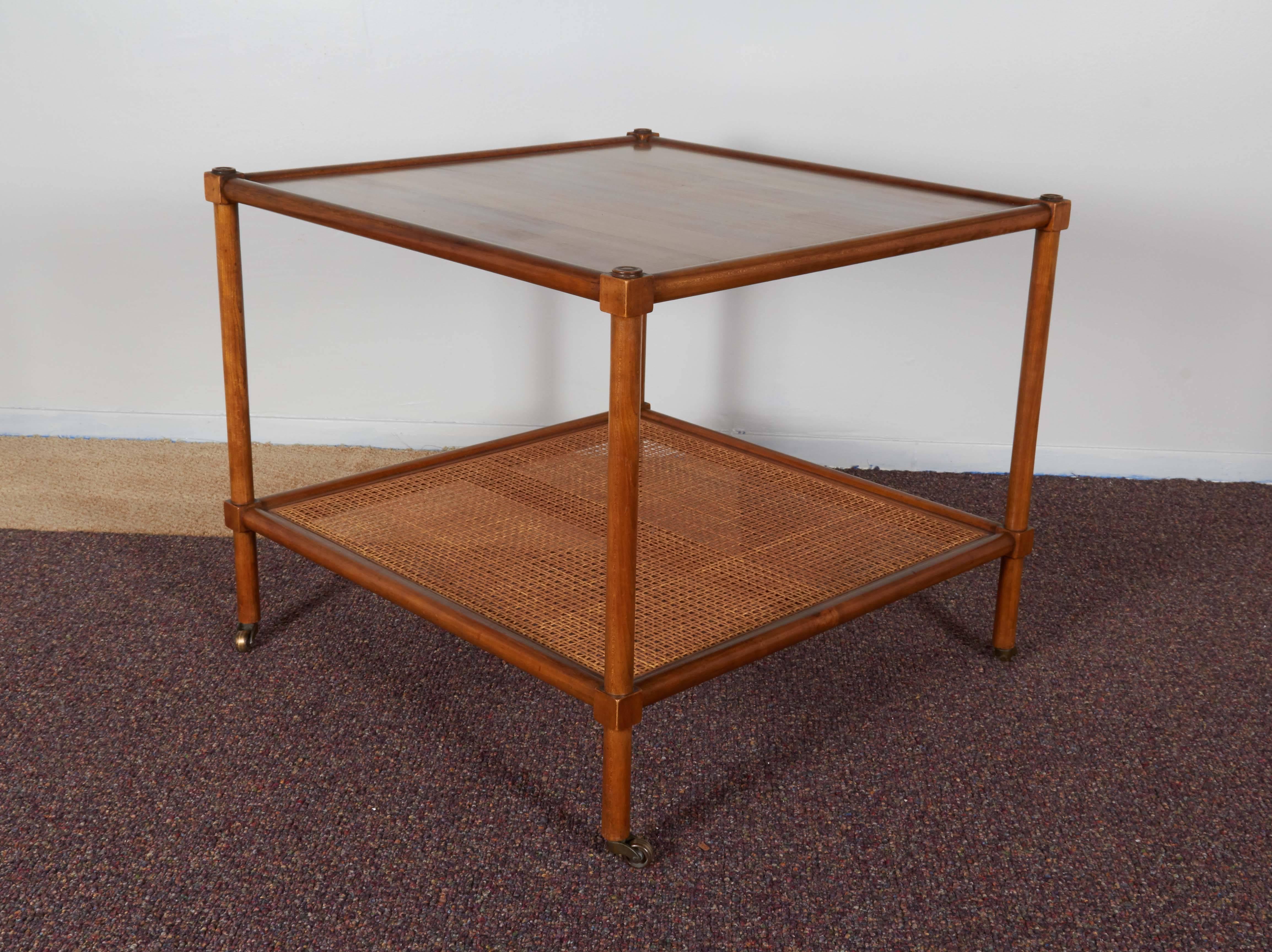 Pair of Baker Rolling Tables with Cane Shelf In Good Condition In New York, NY