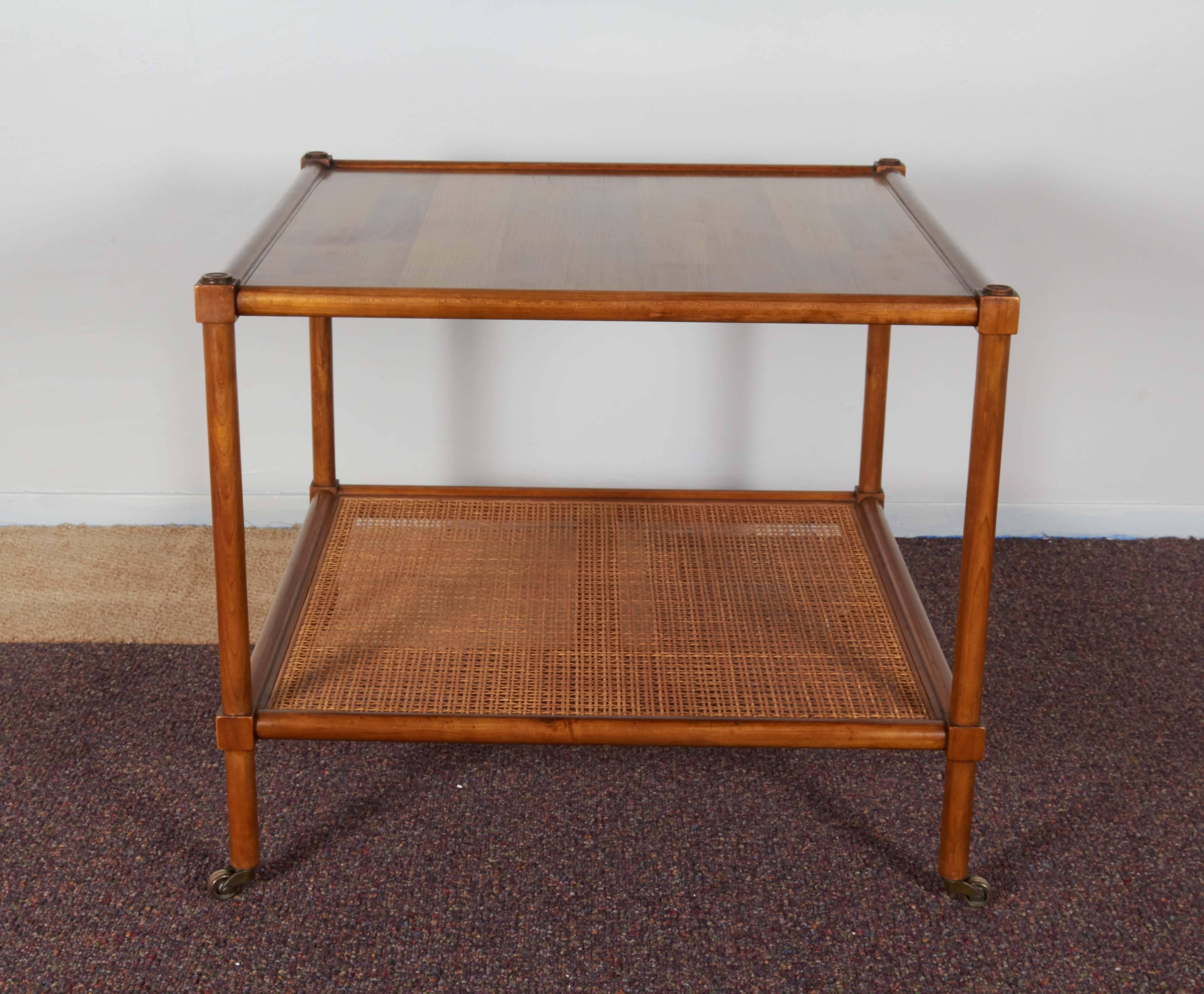 Mid-20th Century Pair of Baker Rolling Tables with Cane Shelf
