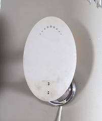 Pair of Mid-Century Oval Chrome Wall Sconces with Perforated Detail