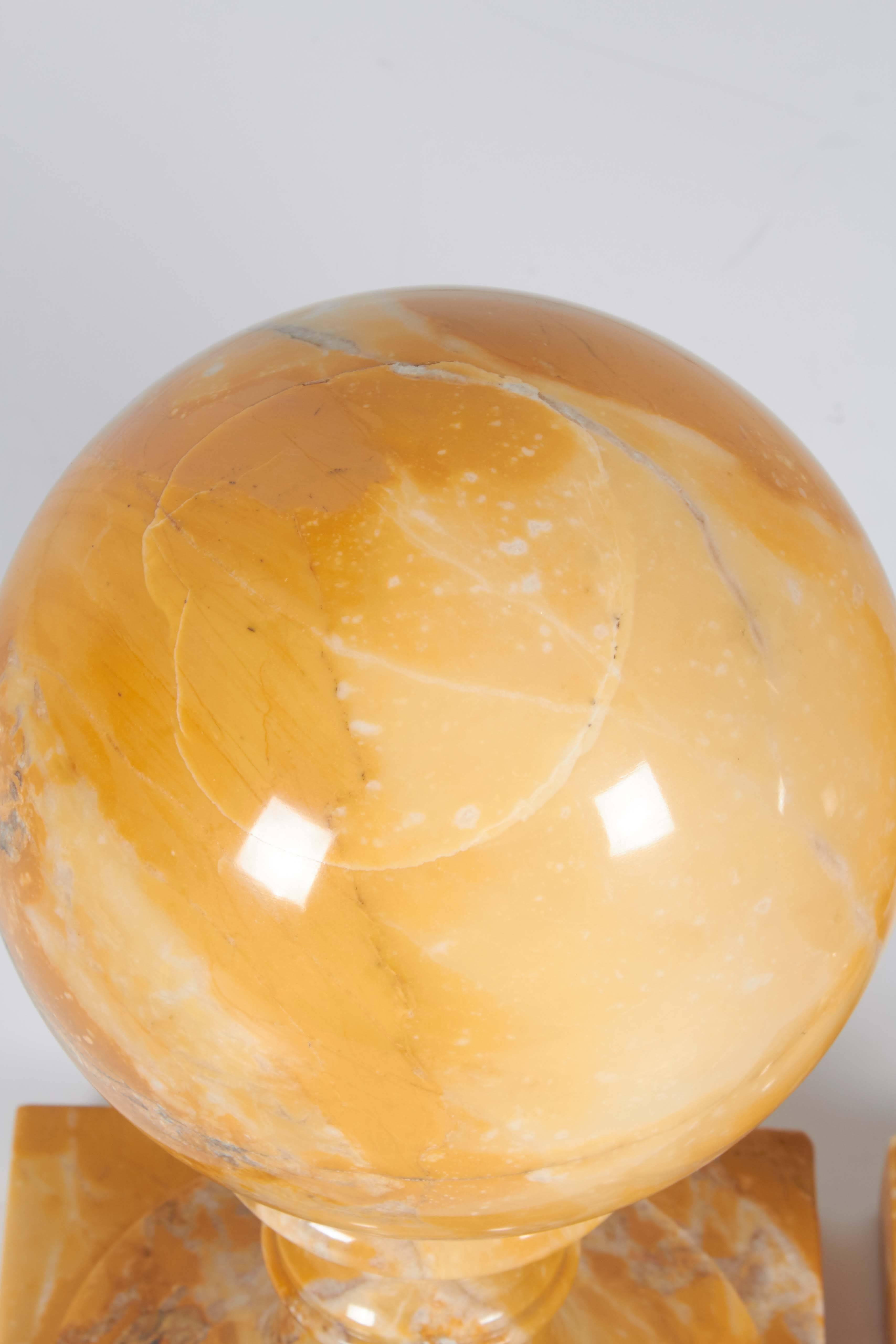 20th Century Pair of Yellow Marble Raised Ball Bookends