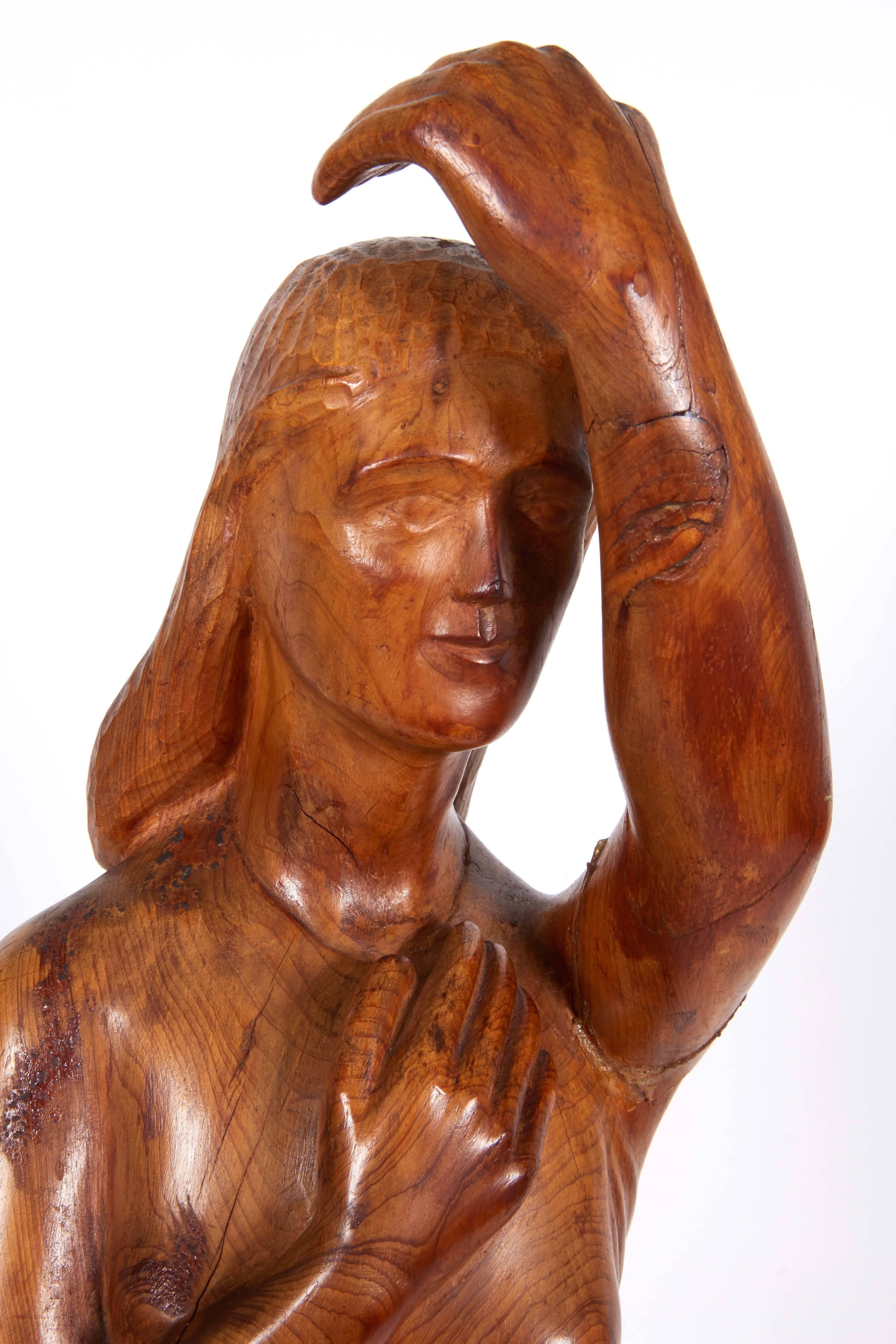 Hand-Carved Wood Sculpture of Woman In Good Condition In New York, NY