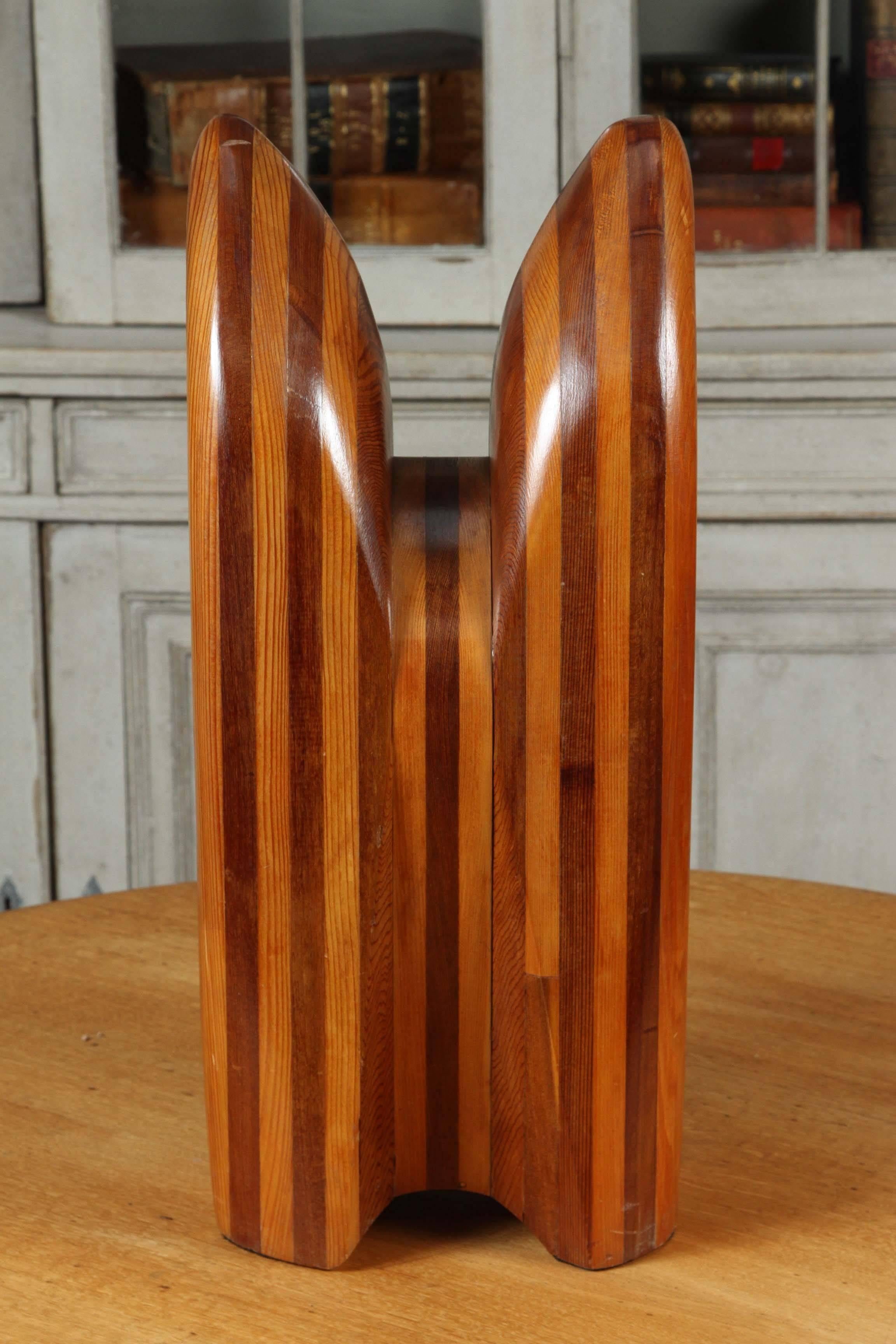 A custom wooden sculpture by Cuban artist Cervino.