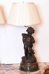 Pair of 19th Century French Patinated Bronze Figures of Cherubs Made into Lamps