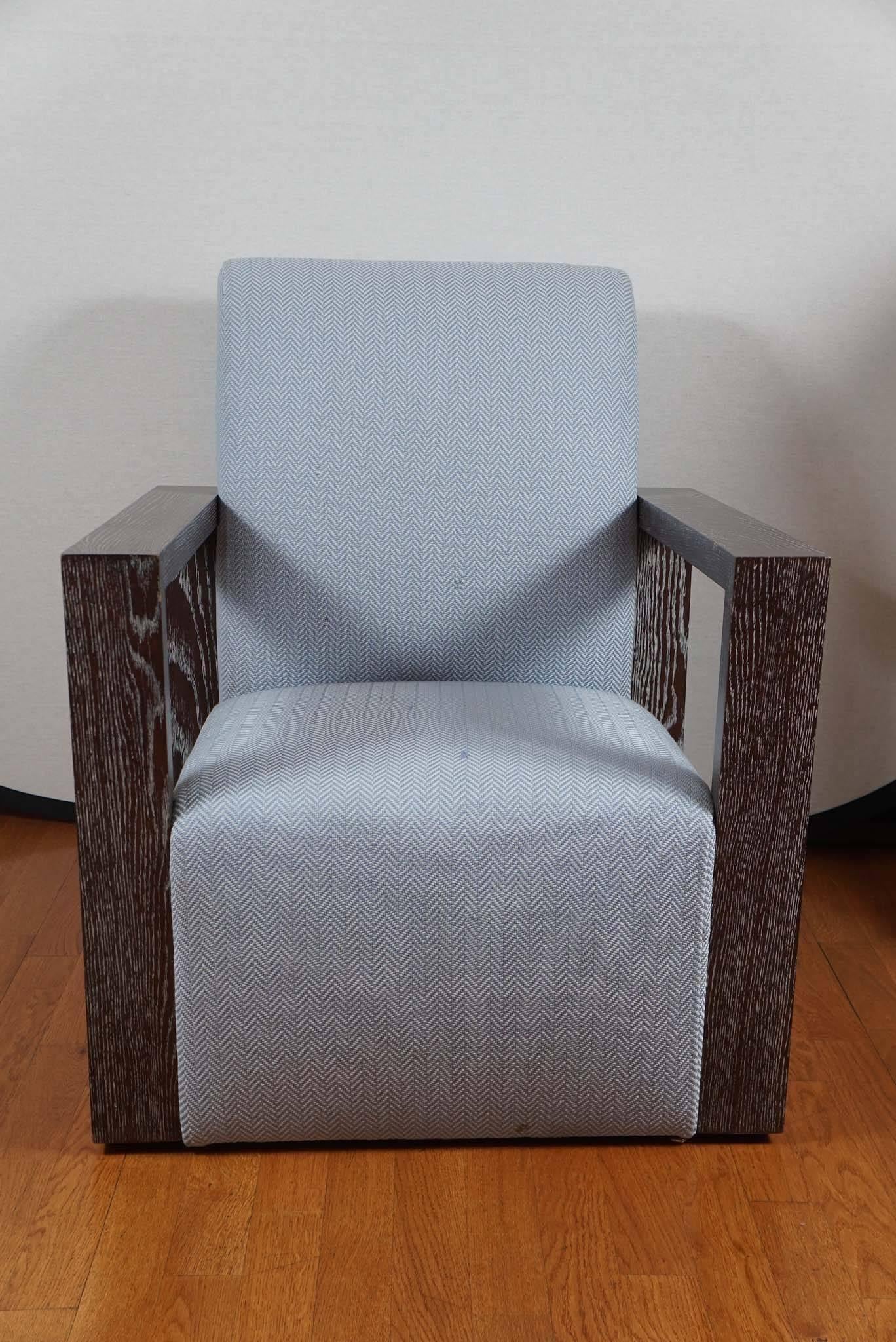 Art Deco style chair with open cerused oak arms.
Finish shown, in cafe latte cerused oak.

Custom finishes available: Cafe latte cerused oak, espresso mahogany, mocha walnut.
10-12 week lead time

COM: 3 yards based on 54