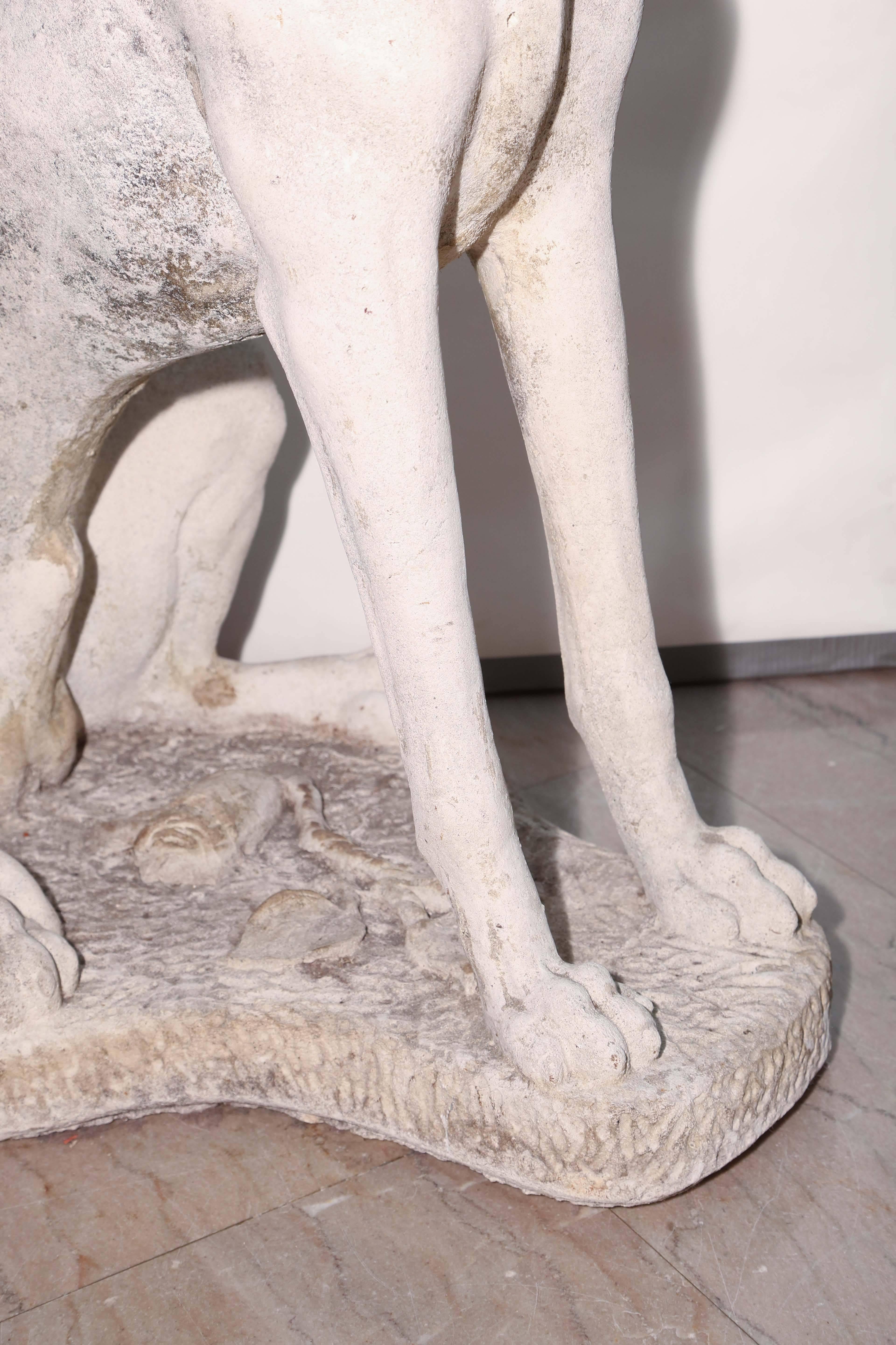 Pair of lifesize Great Danes in cast stone. Dramatic in scale and detail! Beautiful castings.
