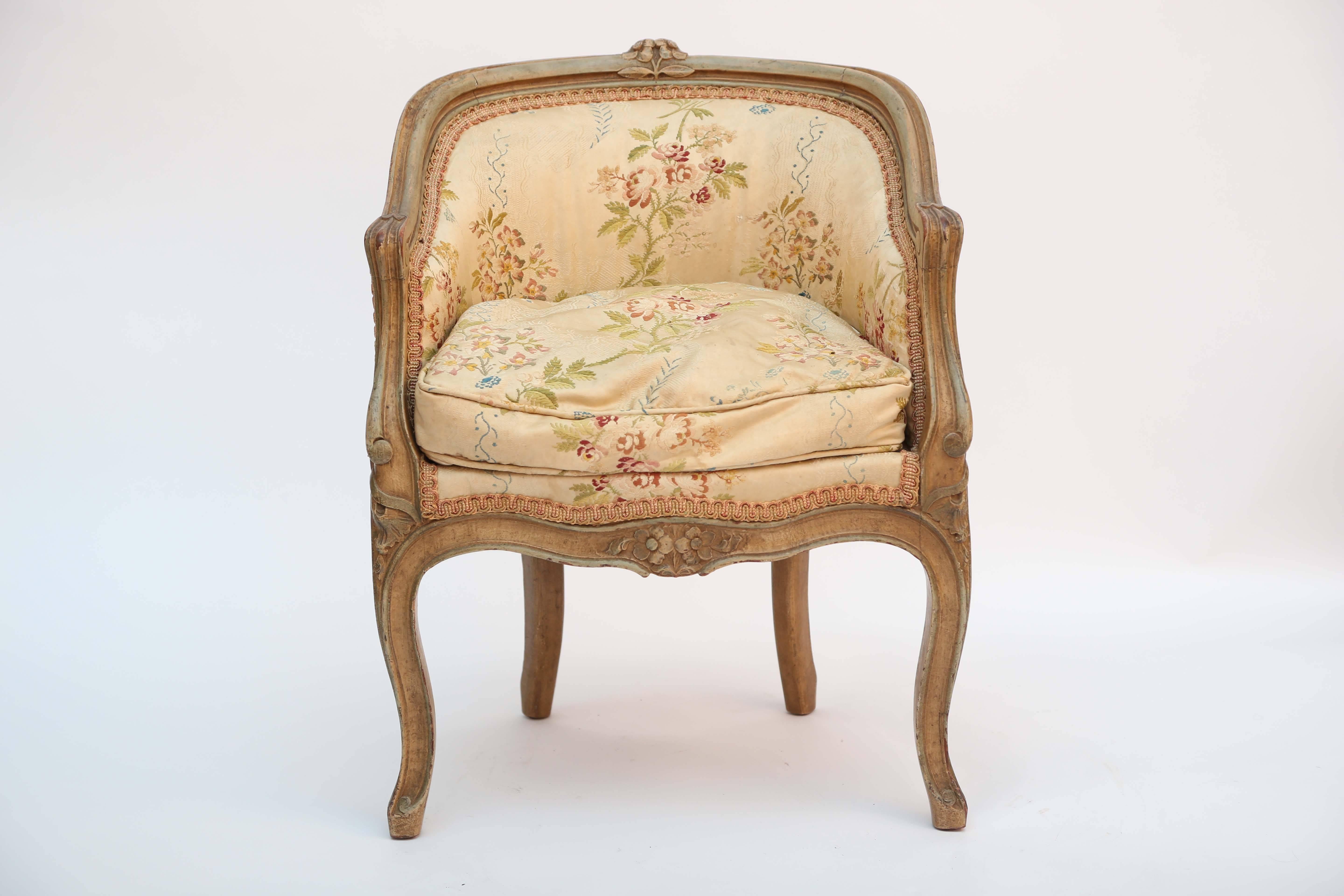 Nicely decorated with alternating colored accents and a a cane seat. A graceful 
