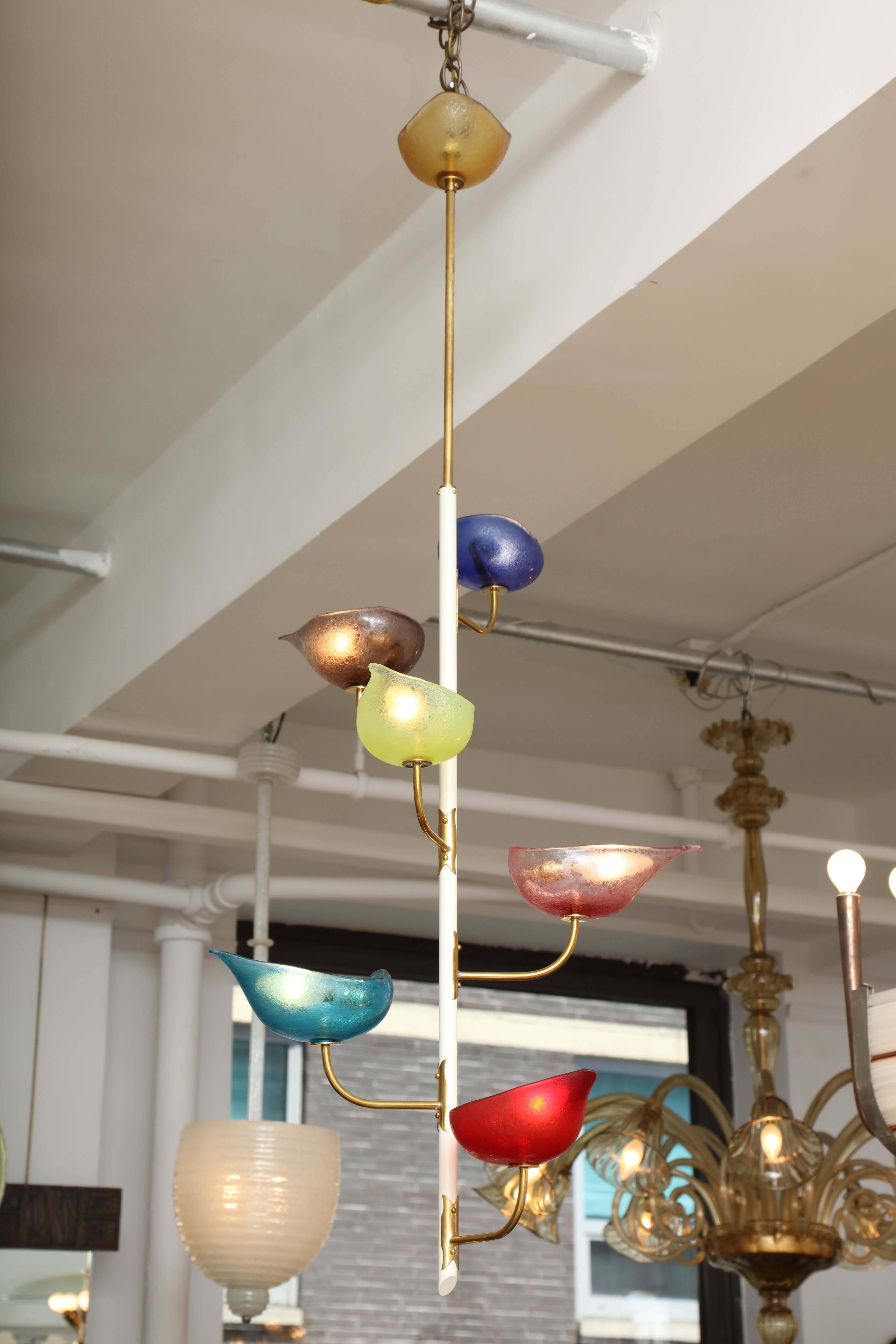 Stunning chandelier / pendant made in Italy with six Seguso acid etched blown glass shades each in a different color and a glass canopy, stem in brass and white lacquer, very unusual, great quality, takes six e14 bulbs.
 