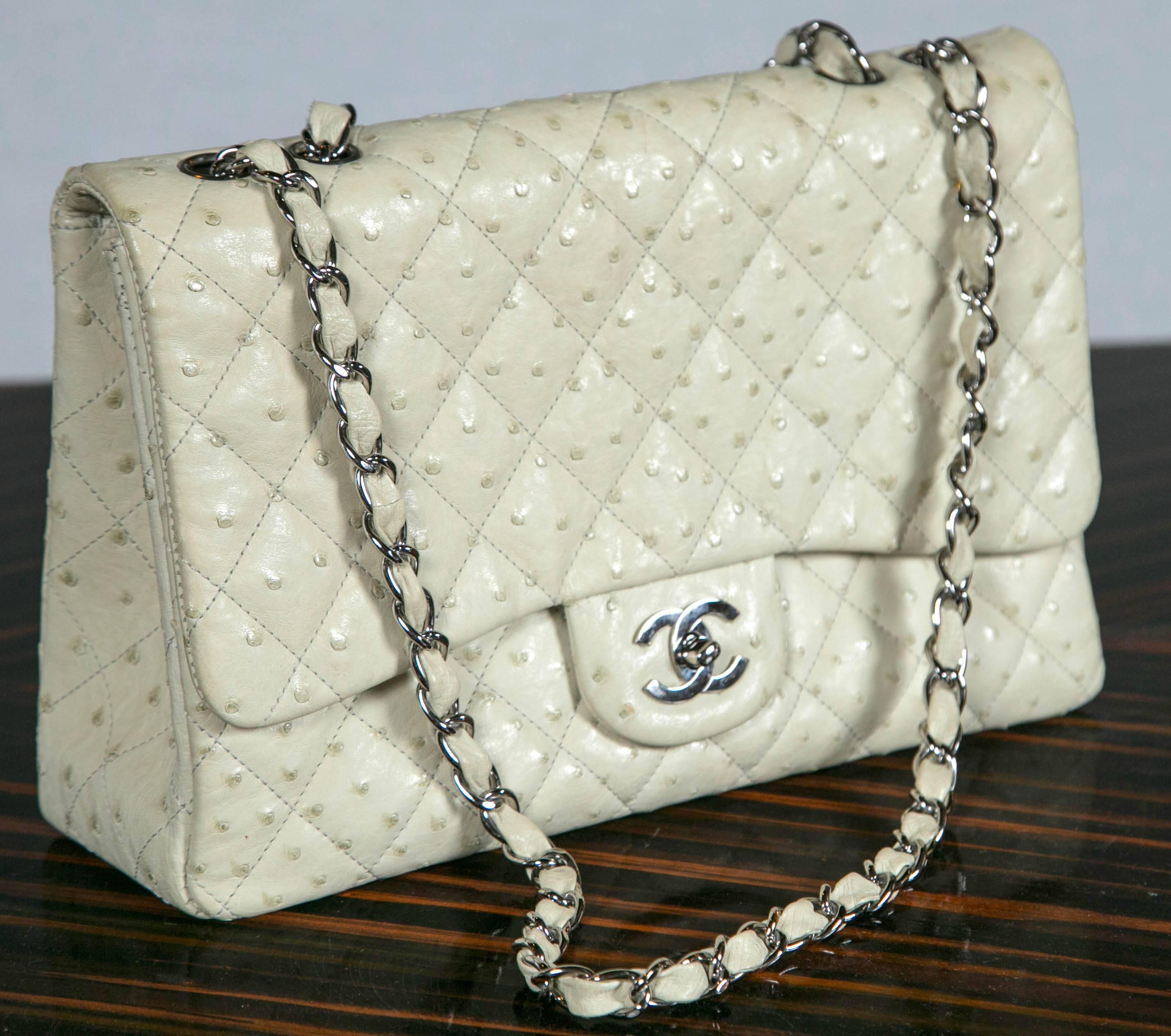 This exotic Chanel is in a luxurious rich beige ostrich skin. Ostrich skin is unmistakable in appearance. It requires a very specialized production process making it quite a bit more expensive than the bovine leathers. Ostrich is considered one of