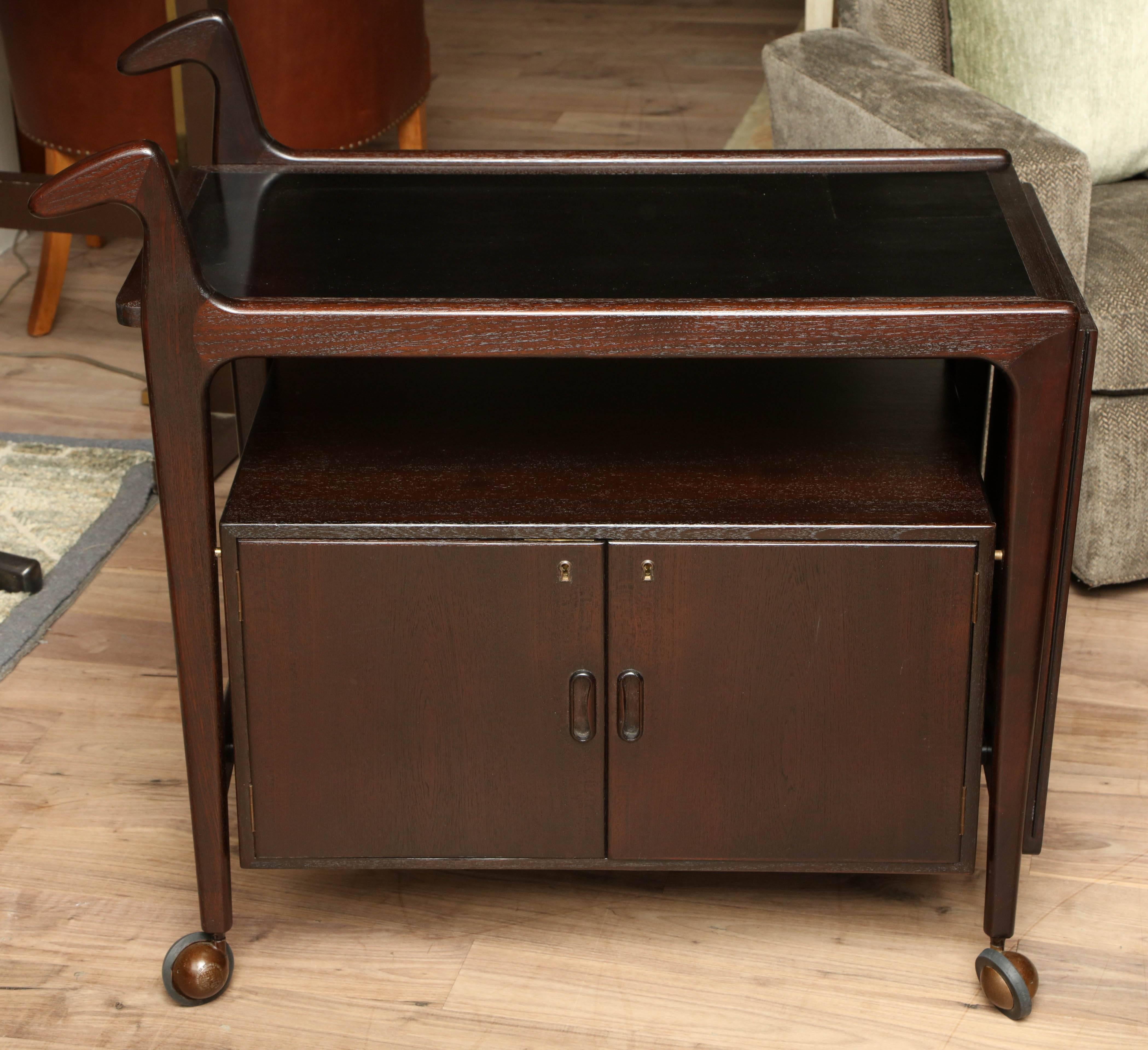 Sable finished drop leaf serving cart from Denmark, circa 1950 - 57