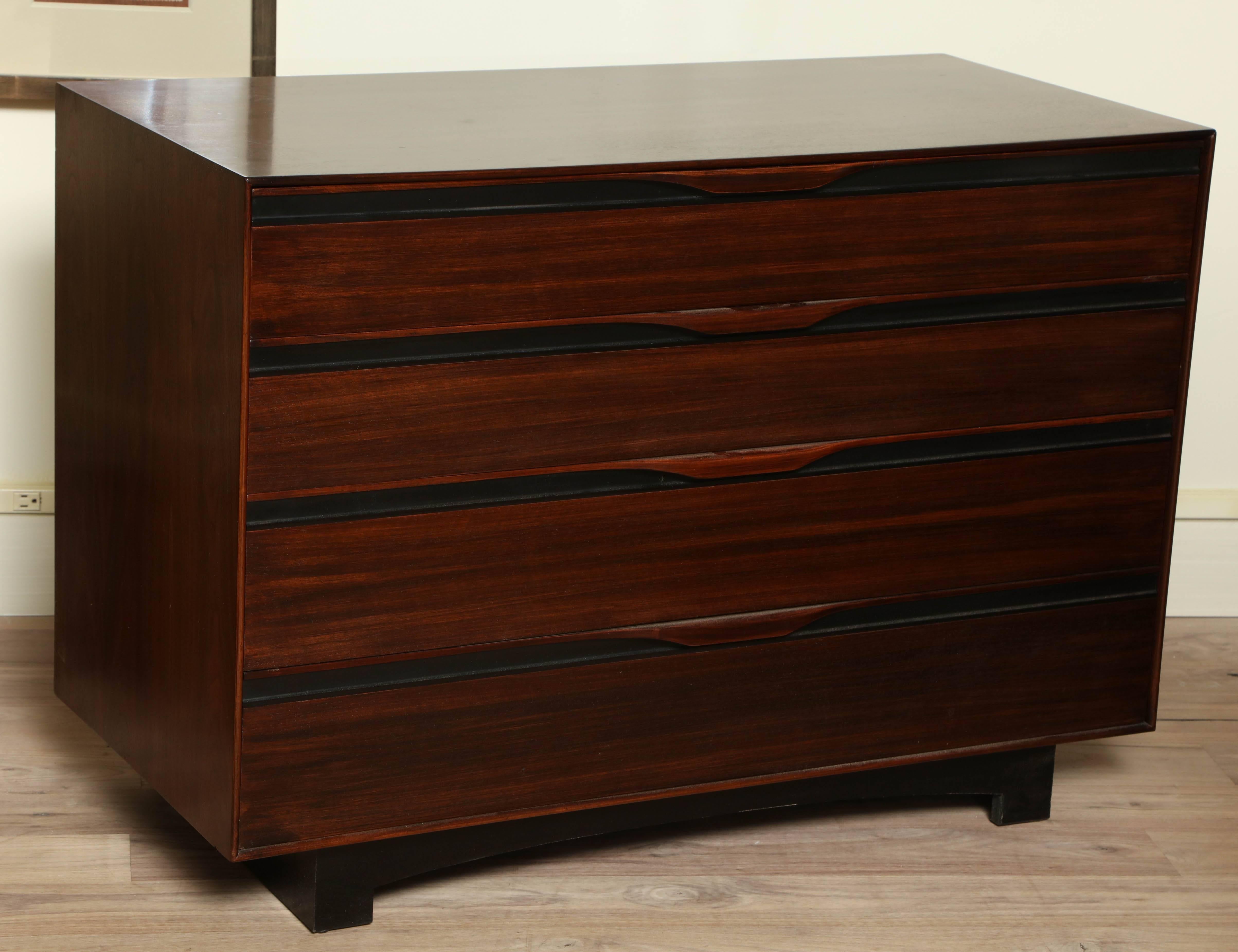 Restored dresser by John Kapel for Glenn of California, circa 1960 with ebony accents and curved drawer pulls.