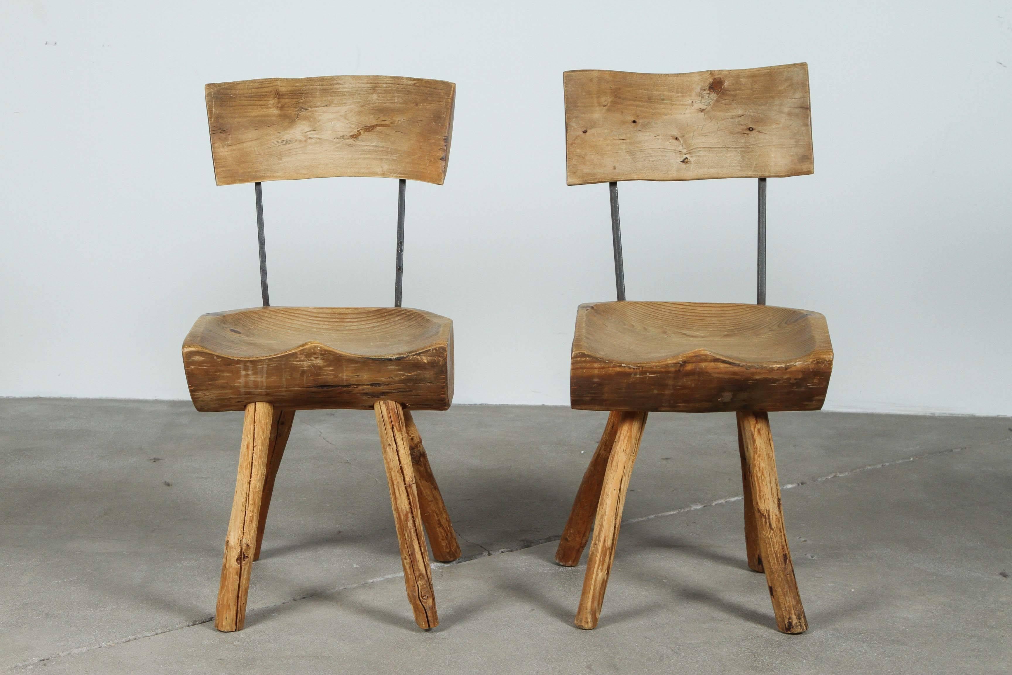 Primitive rustic log chairs.