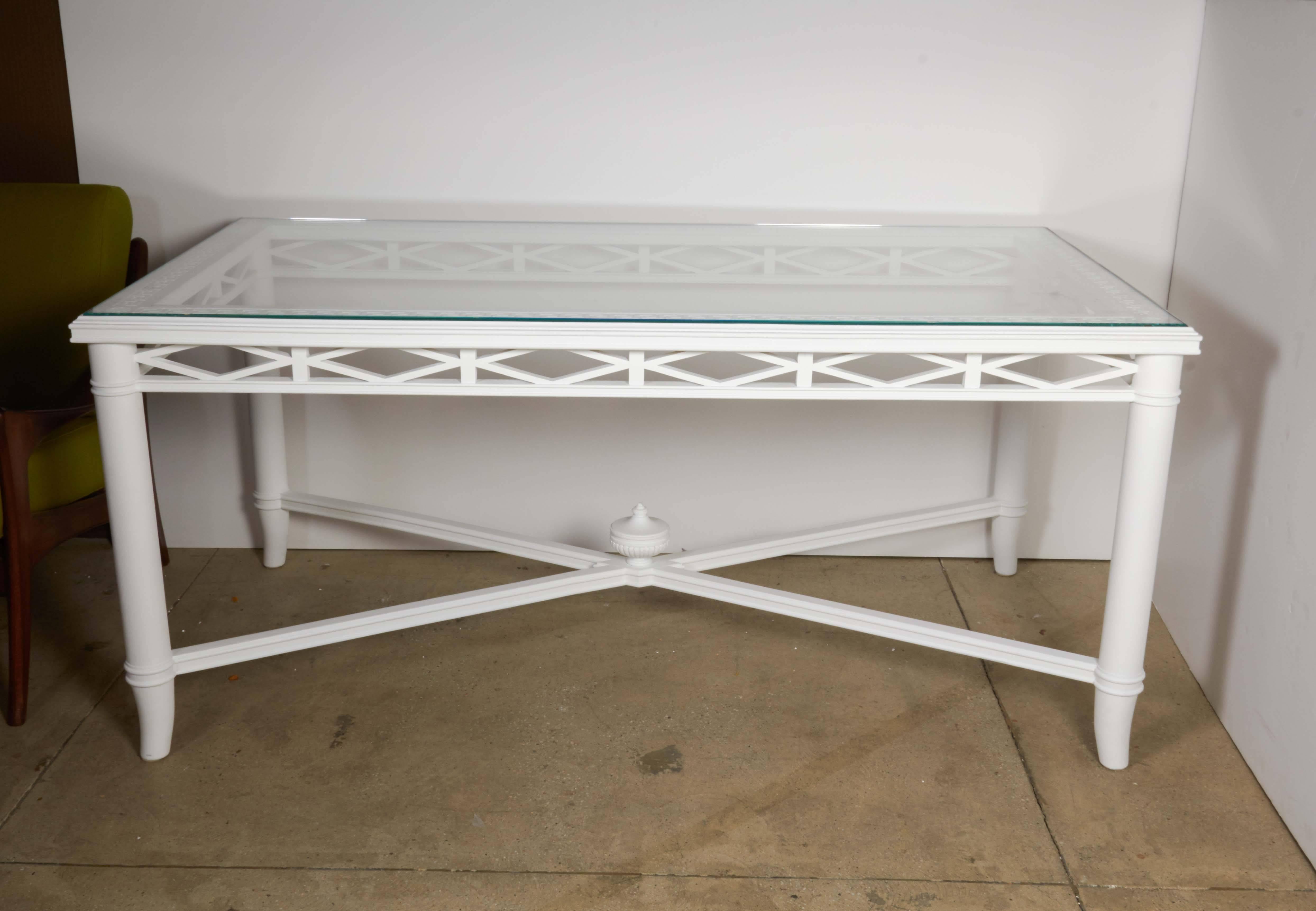 This table could be used as a desk.
The table has a new glass top.