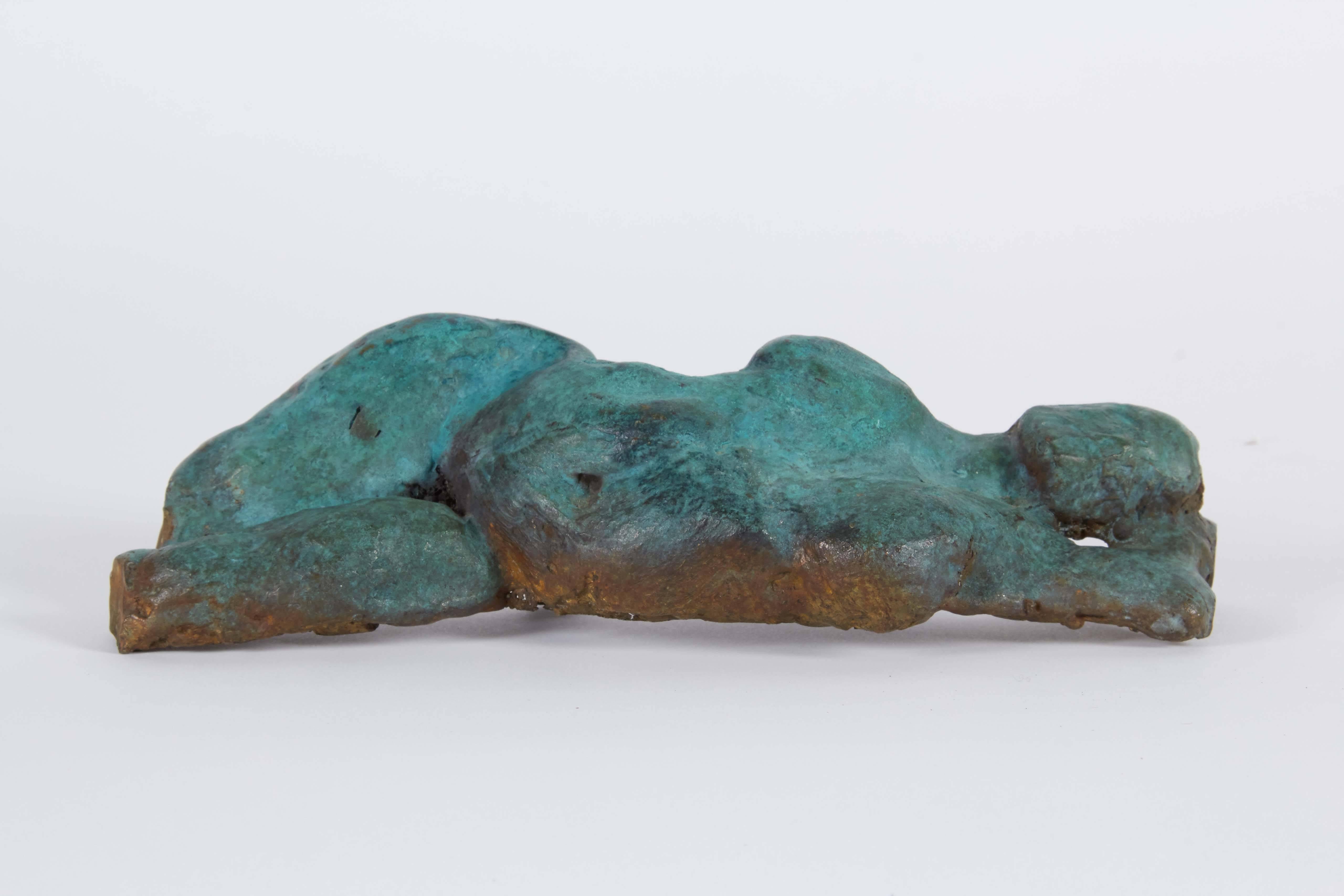 A sculpture depicting an abstract sensual reclining nude in the Brutalist style by an unknown artist, in vibrant green patinated bronze. Very good condition, wear consistent with age and use.

10445