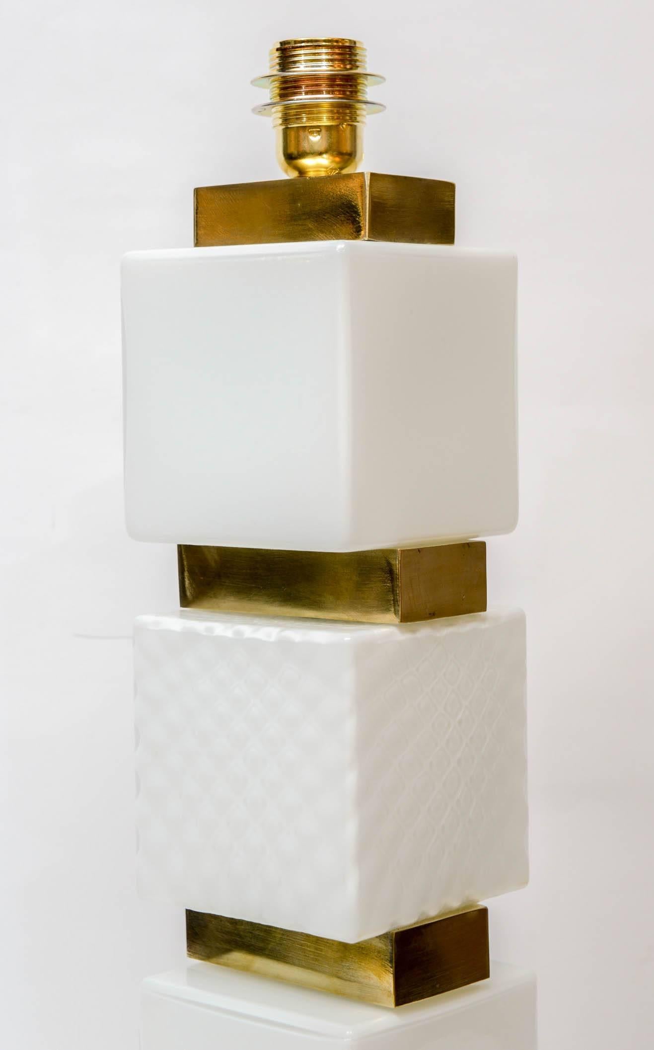 Pair of table lamps in Murano glass and brass.