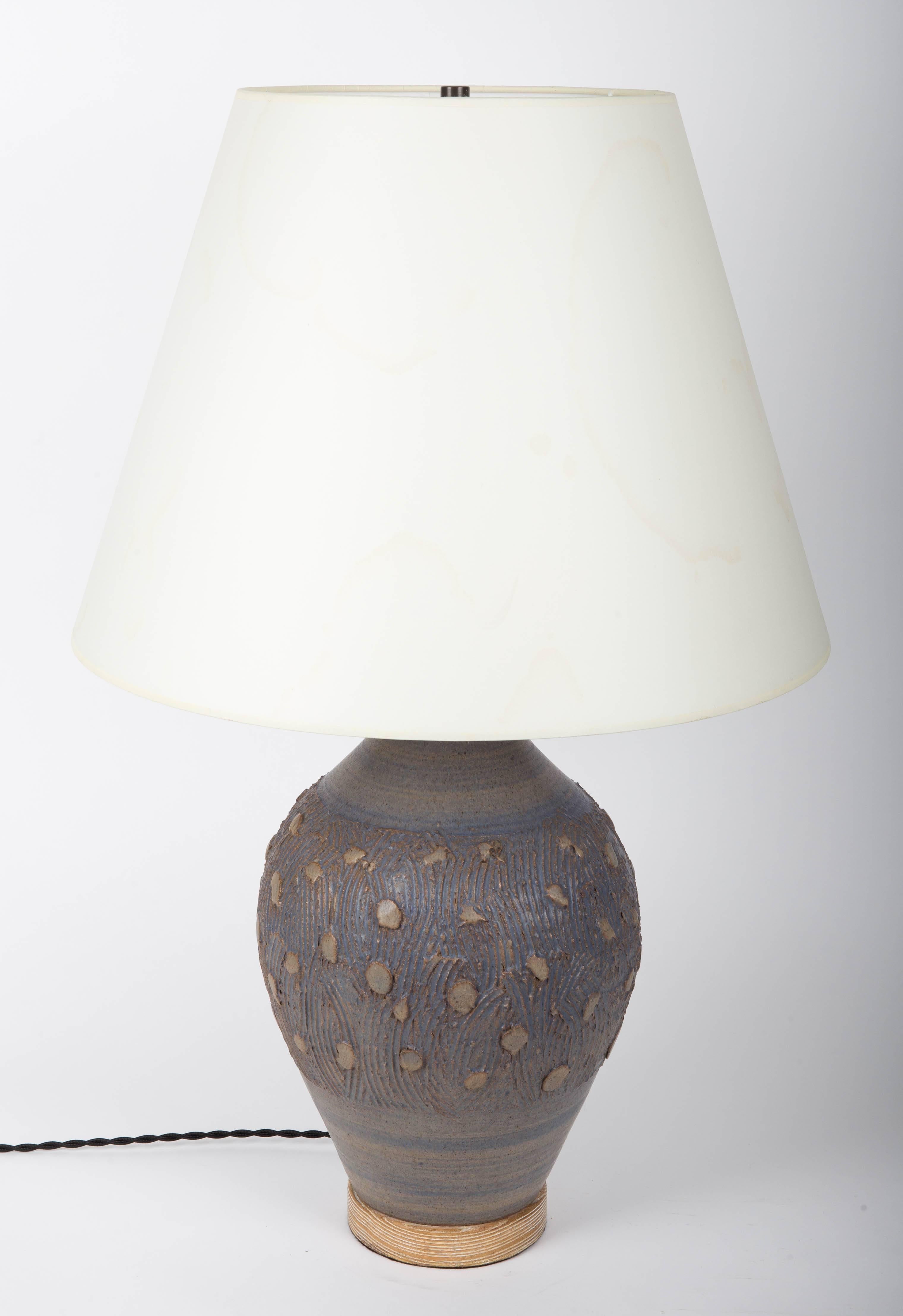 Blue lamp, dotted design, cerused oak base.