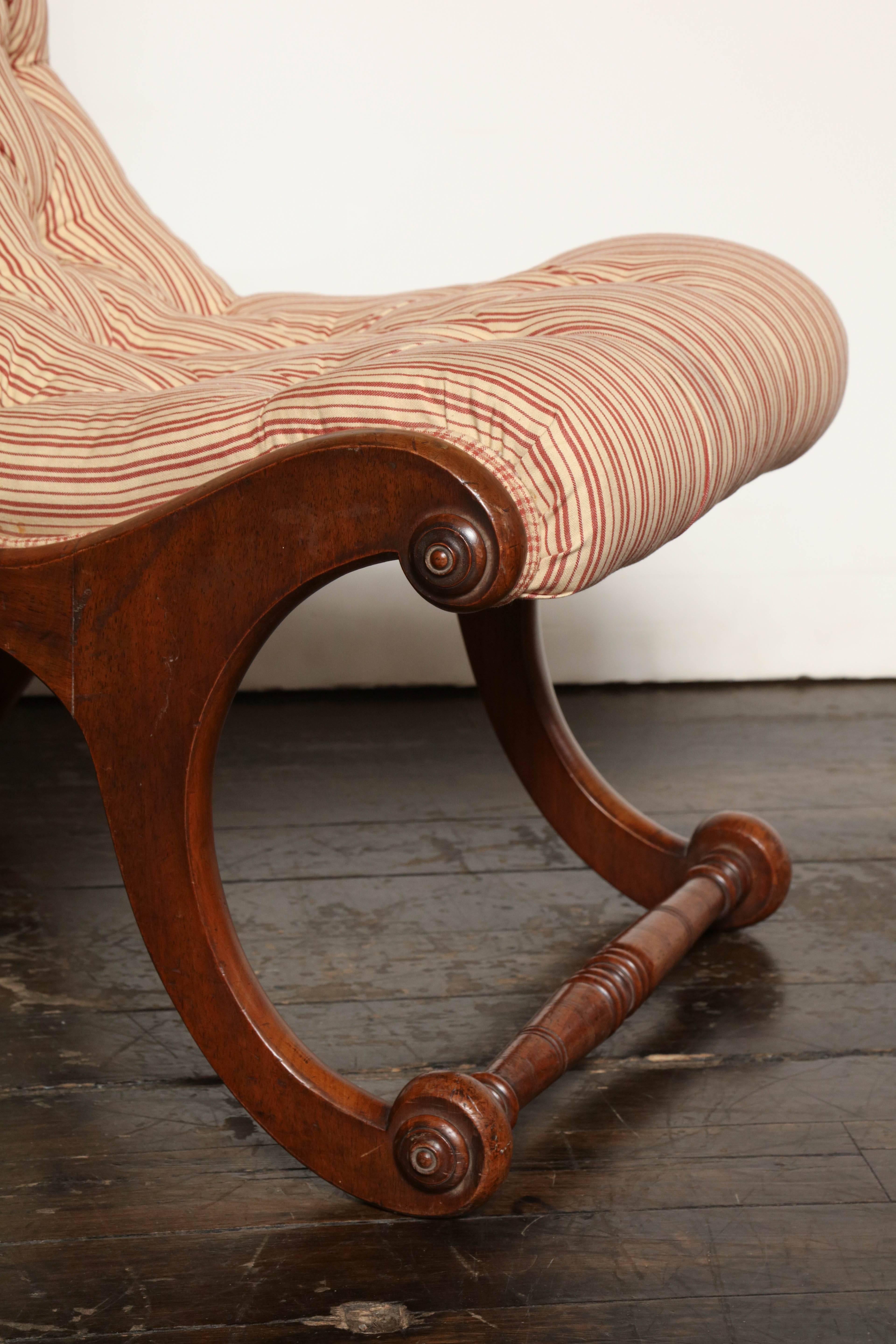 Mid-19th century English, mahogany slipper chair.