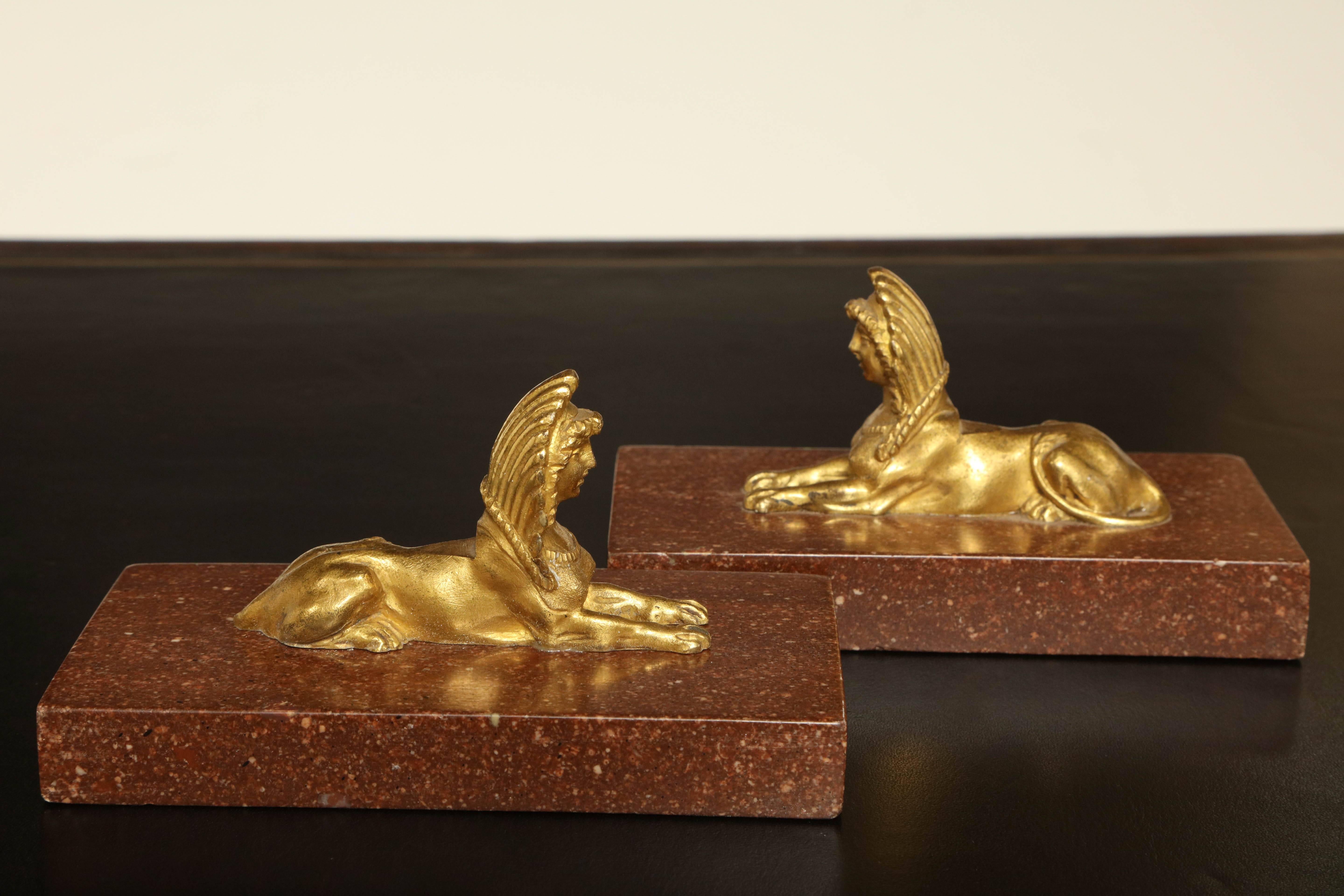 Swedish Pair of Gilded Bronze Sphinx on Porphyry