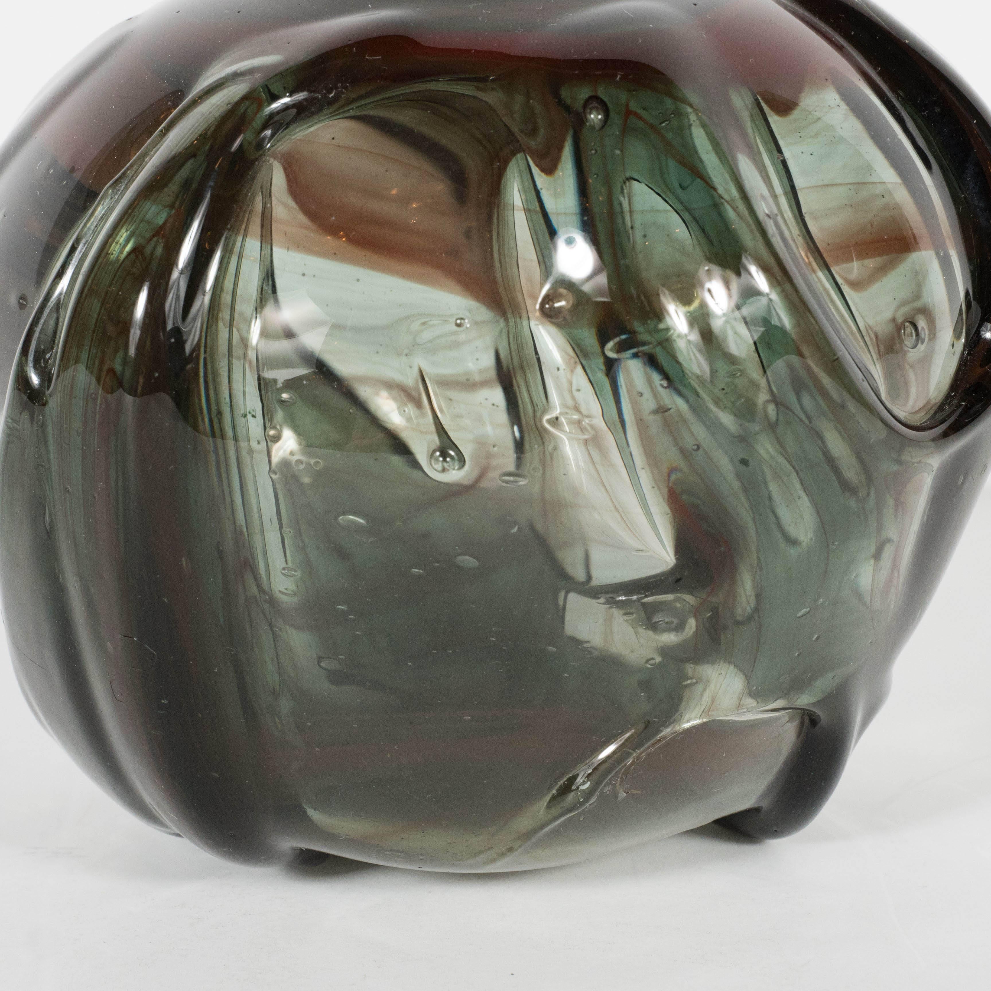 This gorgeous textured handblown Murano glass vase is a rich smoked tourmaline with swirls of cinnabar. It is a great accent piece or wonderful to add to a glass collection. It is in excellent condition.
