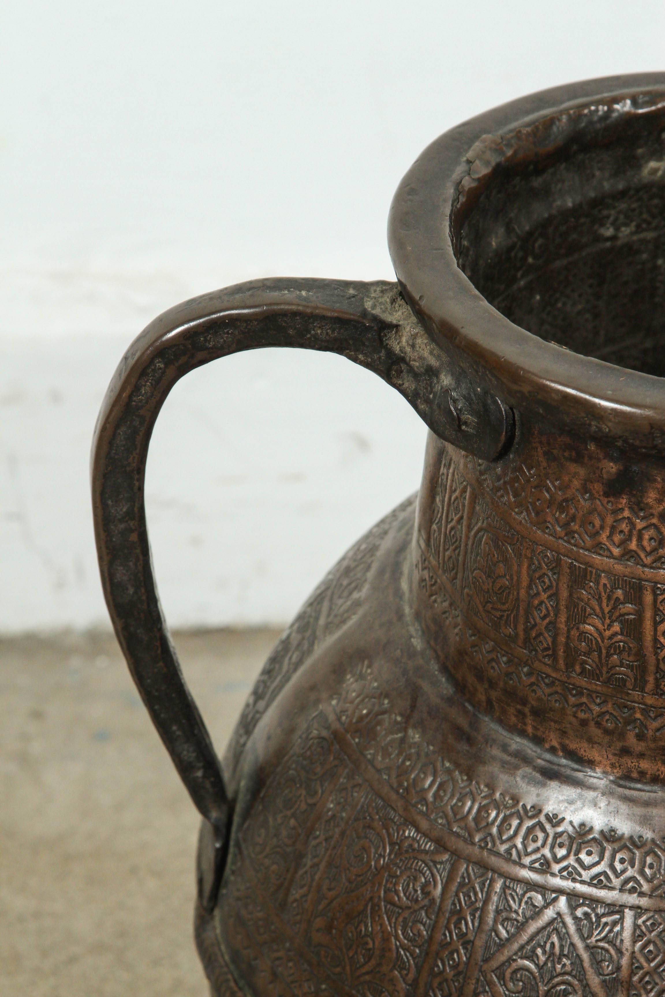 large copper pot with handles